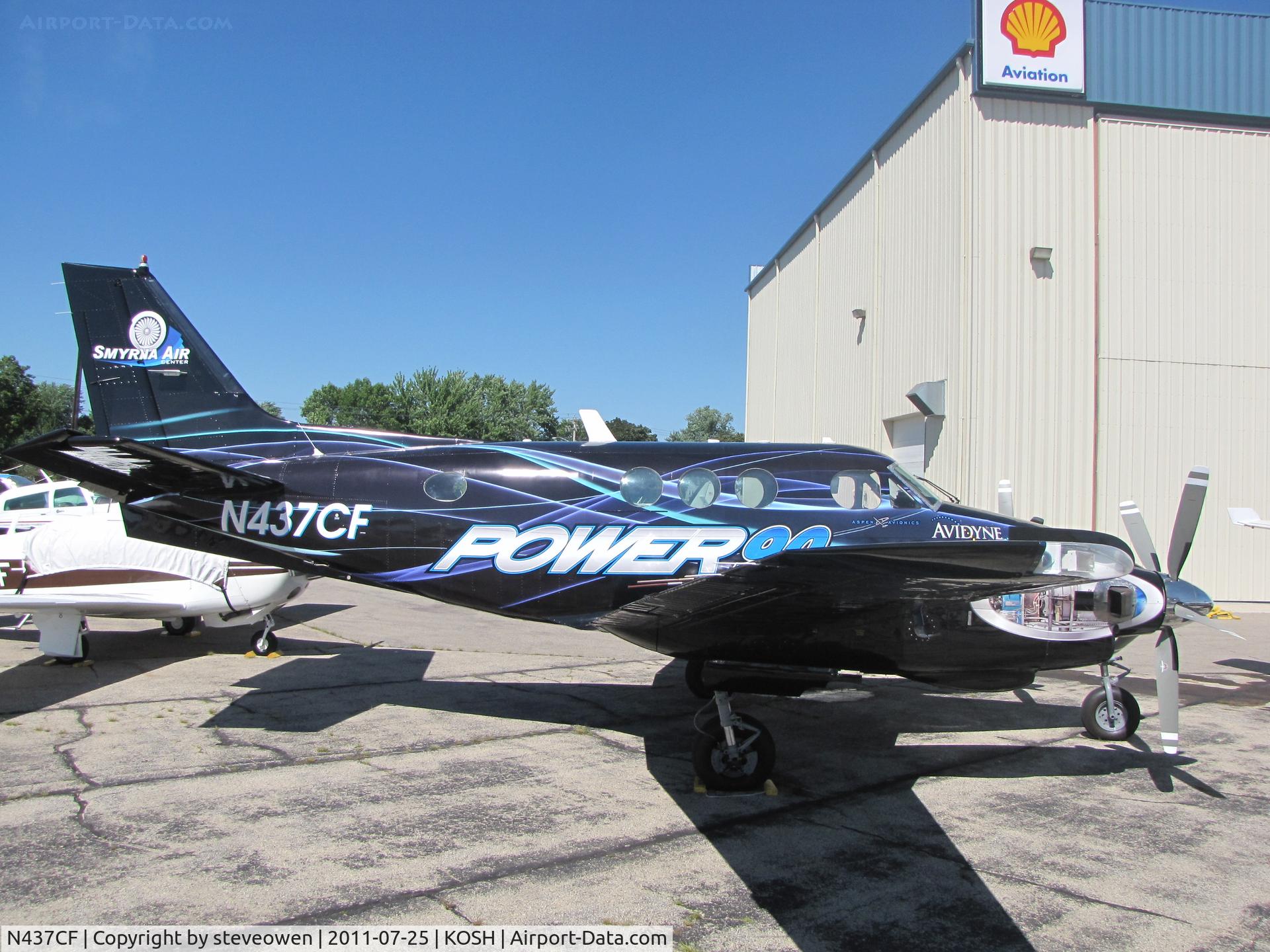 N437CF, 1965 Beech 65-A90 C/N LJ-140, colourful King Air C90 on the Orion FBO ramp during EAA2011 @ KOSH