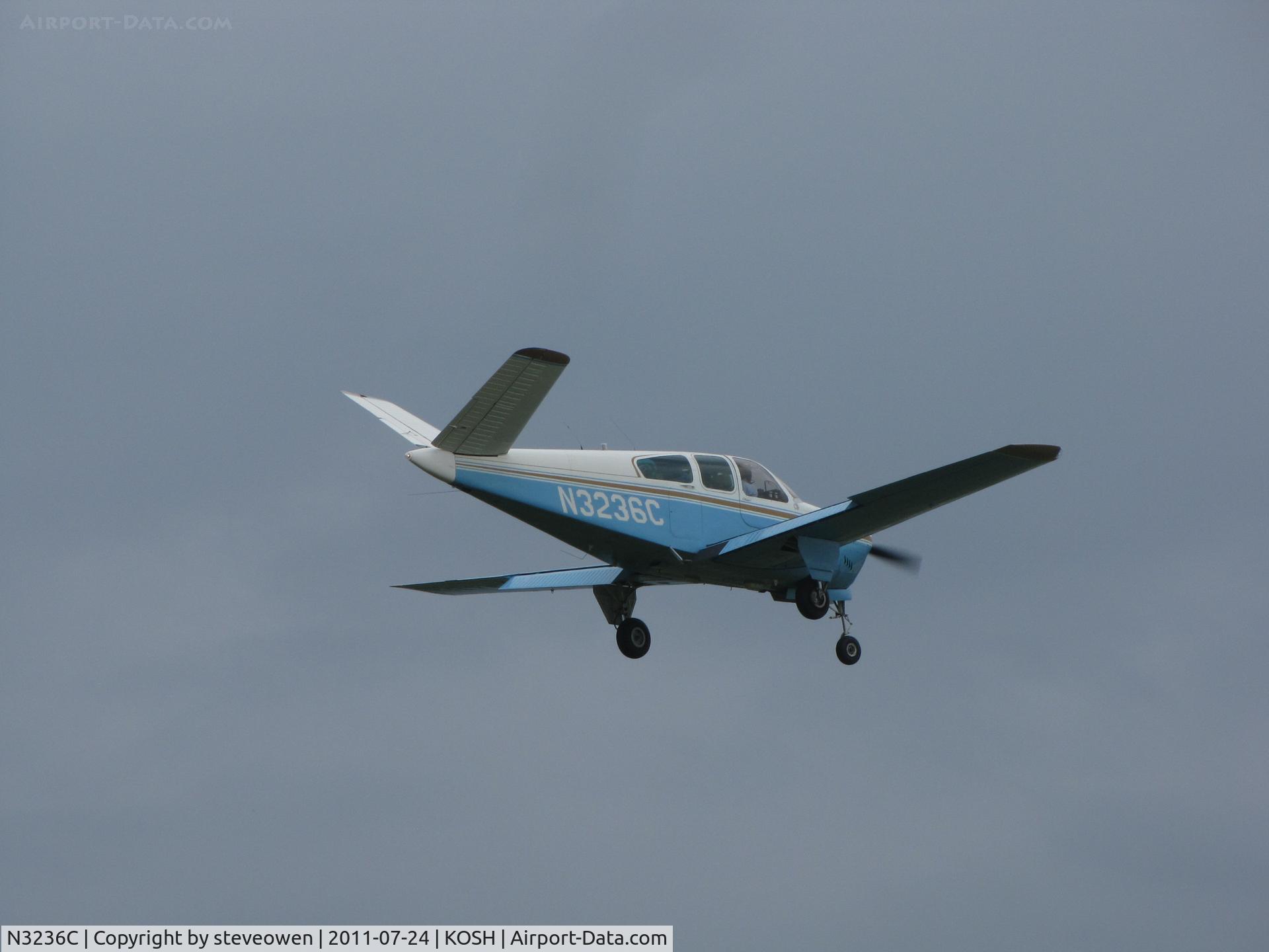 N3236C, 1954 Beech E35 C/N D-3901, landing Rwy 09 during EAA 2011