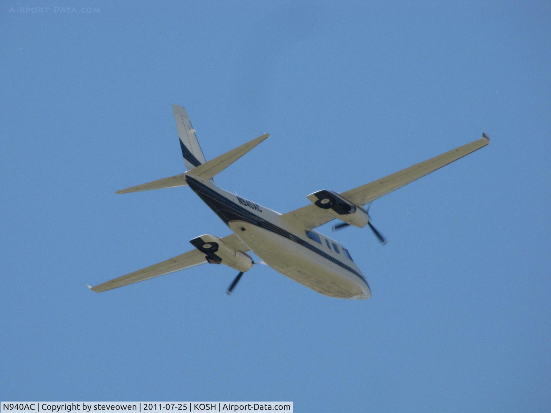 N940AC, 1980 Rockwell Commander 695 C/N 11629, over head @ KOSH EAA 2011