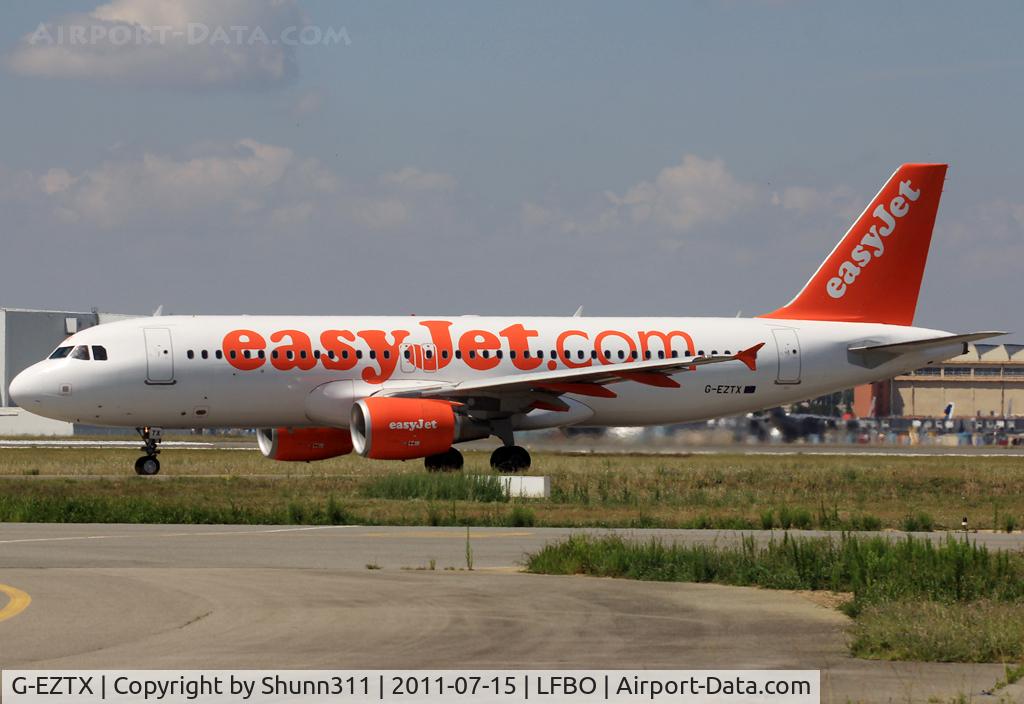 G-EZTX, 2010 Airbus A320-214 C/N 4286, Taxiing holding point rwy 32R for departure...