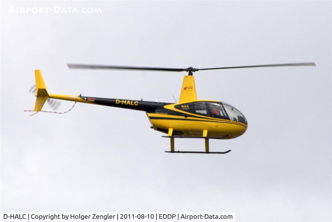 D-HALC, 2001 Robinson R44 Raven C/N 1003, Suddenly a yellow something was in the sky....