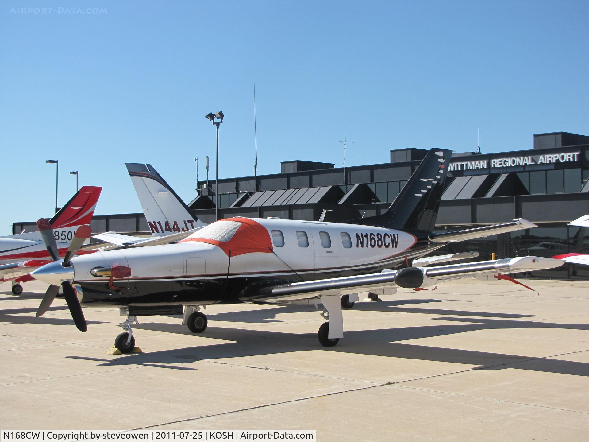 N168CW, 1991 Socata TBM-700 C/N 30, Parked on the orion FBO ramp during EAA2011