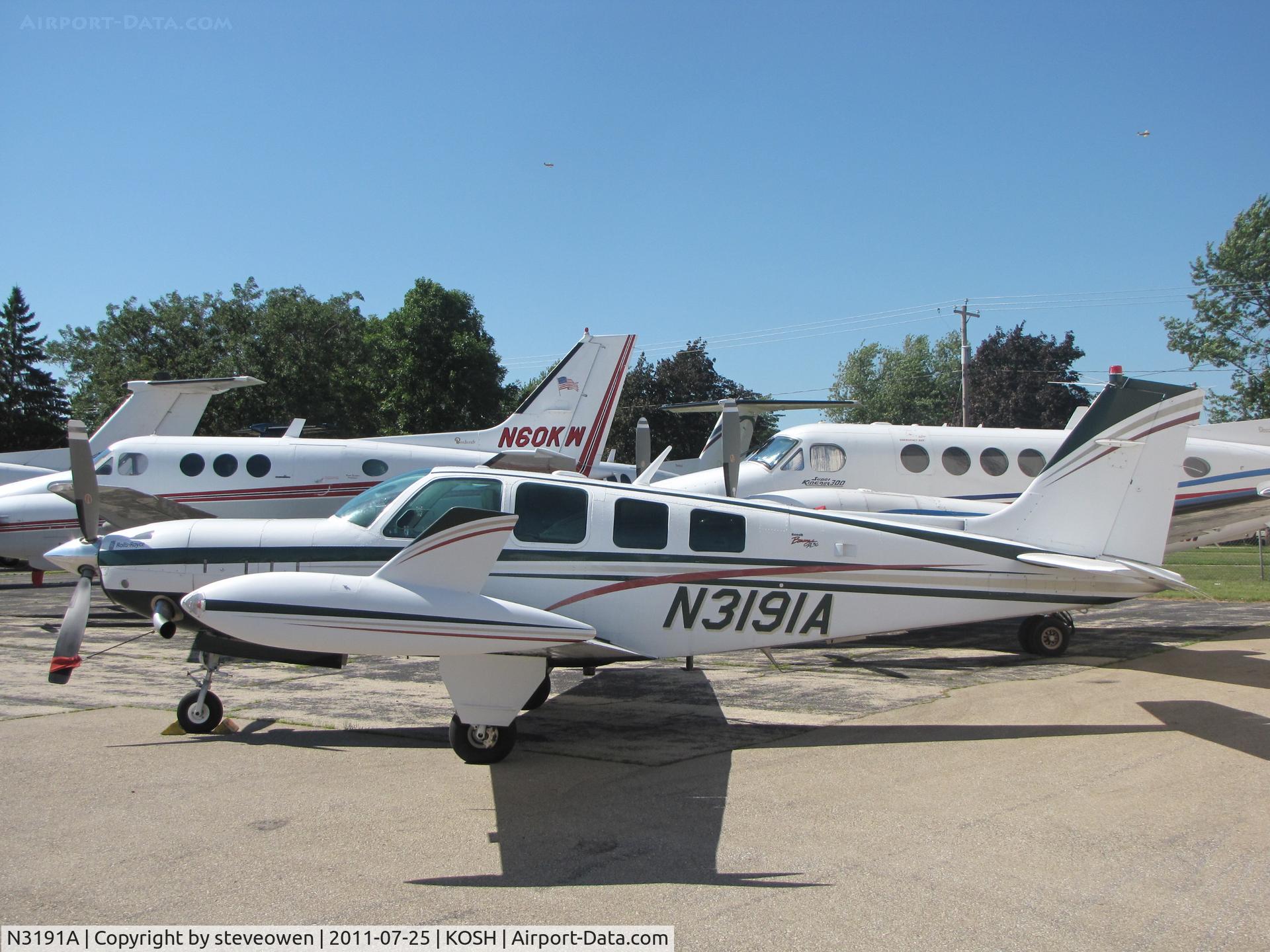 N3191A, 1999 Raytheon Aircraft Company A36 Bonanza C/N E-3291, @ Basler FBO during EAA 2011