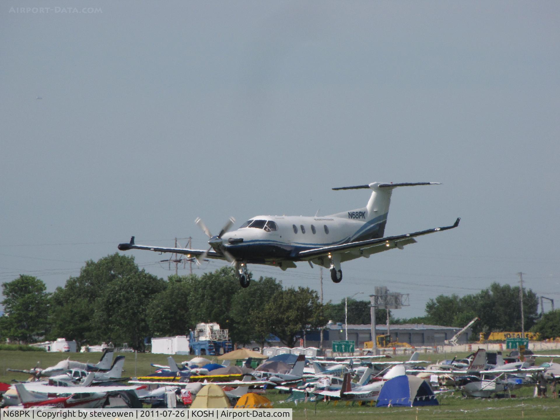 N68PK, 1999 Pilatus PC-12/45 C/N 265, Landing Rwy 09 at EAA 2011.