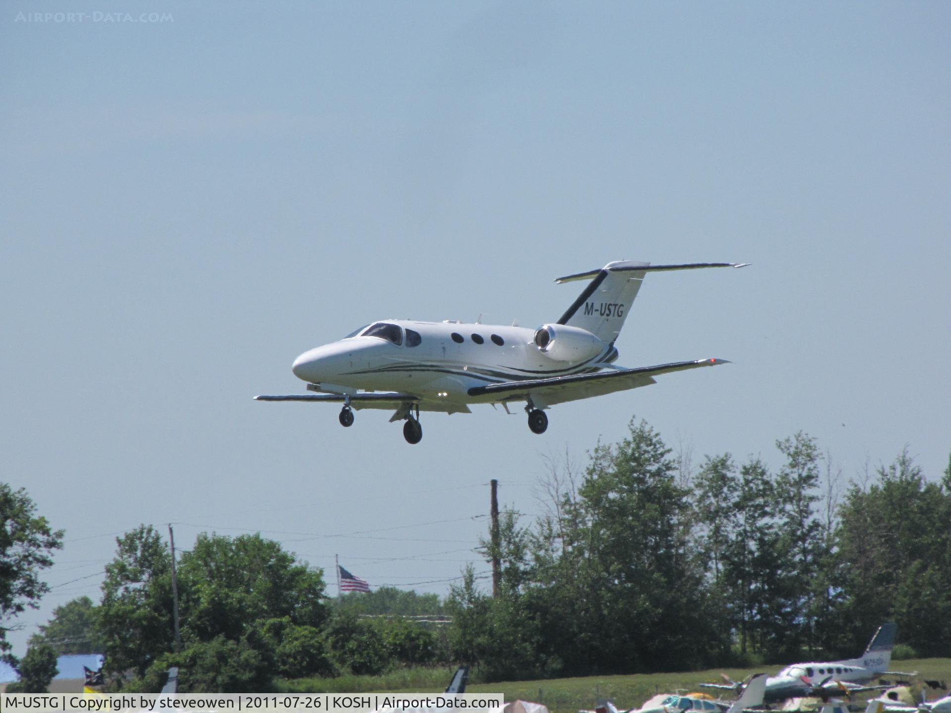 M-USTG, 2009 Cessna 510 Citation Mustang Citation Mustang C/N 510-0182, landing @ KOSH during EAA 2011