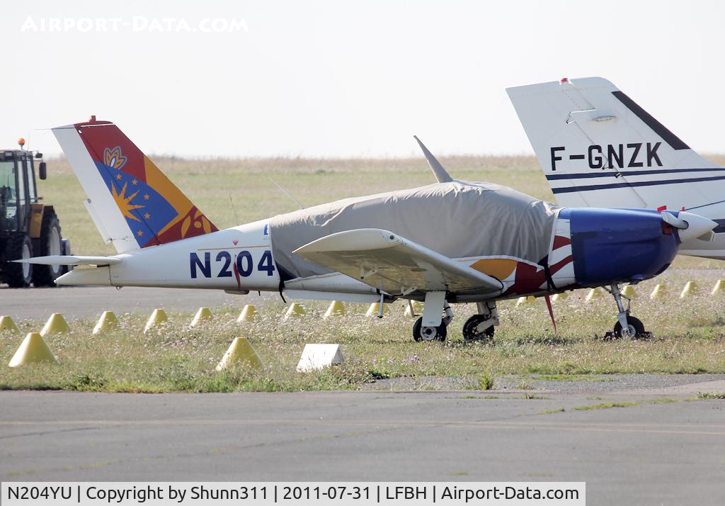 N204YU, Socata TB-20 Trinidad C/N 910, Parked in the grass...