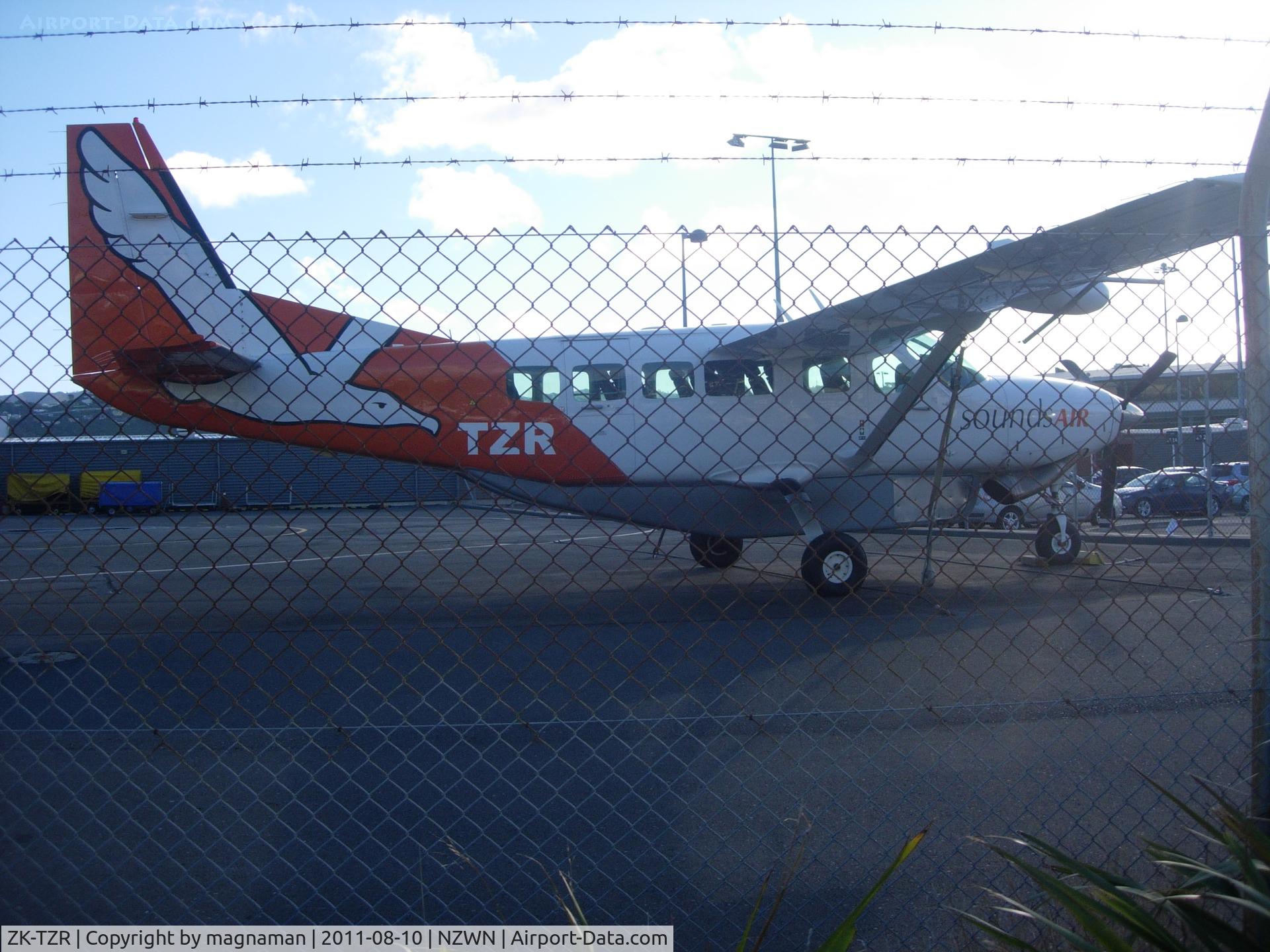 ZK-TZR, 2002 Cessna 208 Caravan I C/N 20800360, On apron at Wellington with its two sister aircraft close by.
