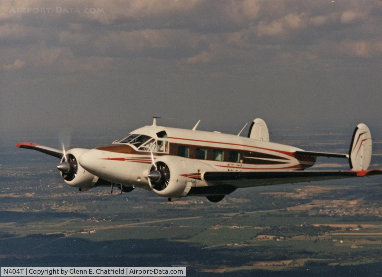 N404T, 1959 Beech E18S-9700 Twin Beech C/N BA-432, This is scanned from a 10X13 original given to me by Dick Hansen (then owner) in 1985.  I don't know when or where the photo was taken.