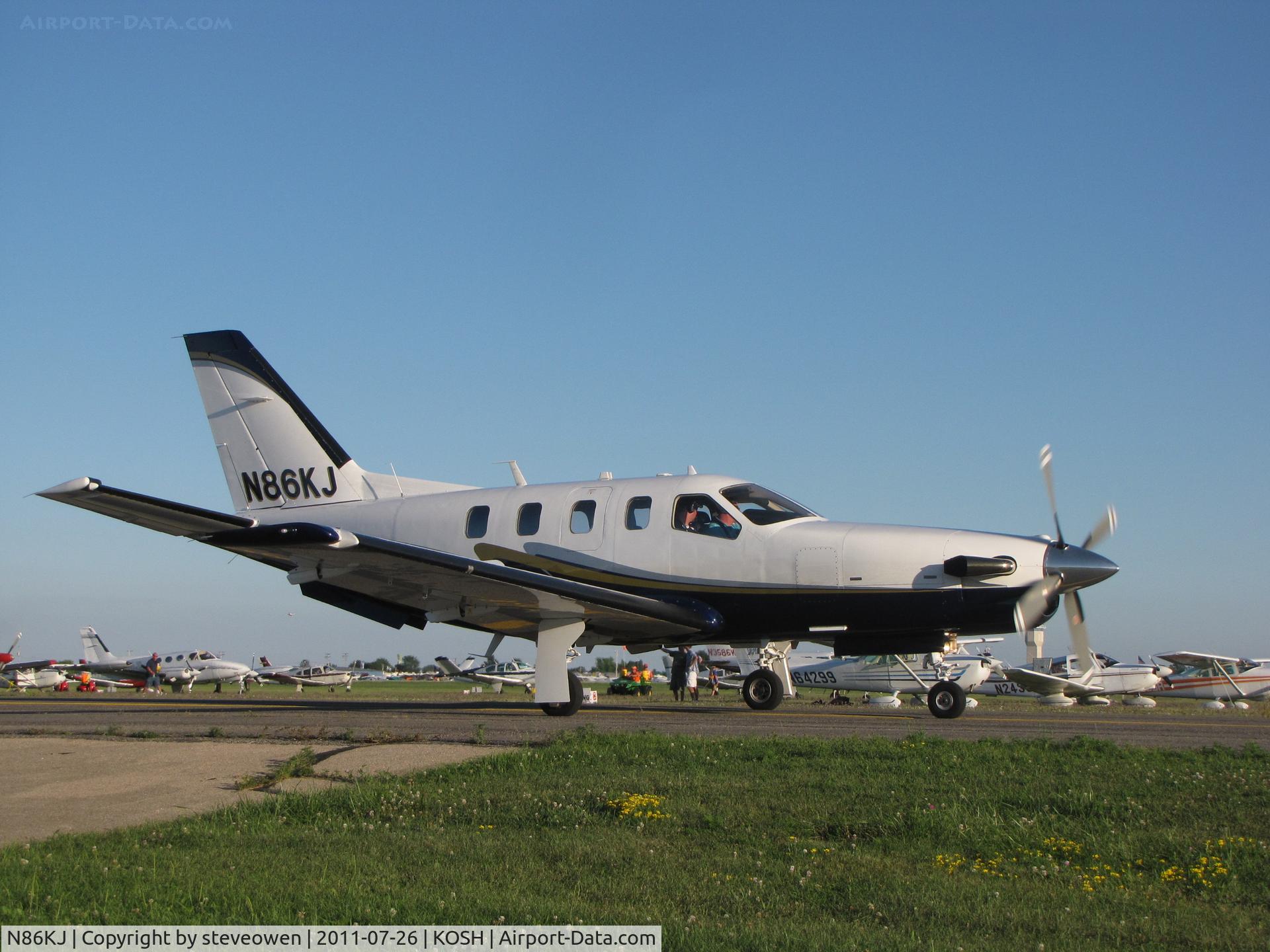 N86KJ, 2008 Socata TBM-700 C/N 490, Taxing out during EAA 2011
