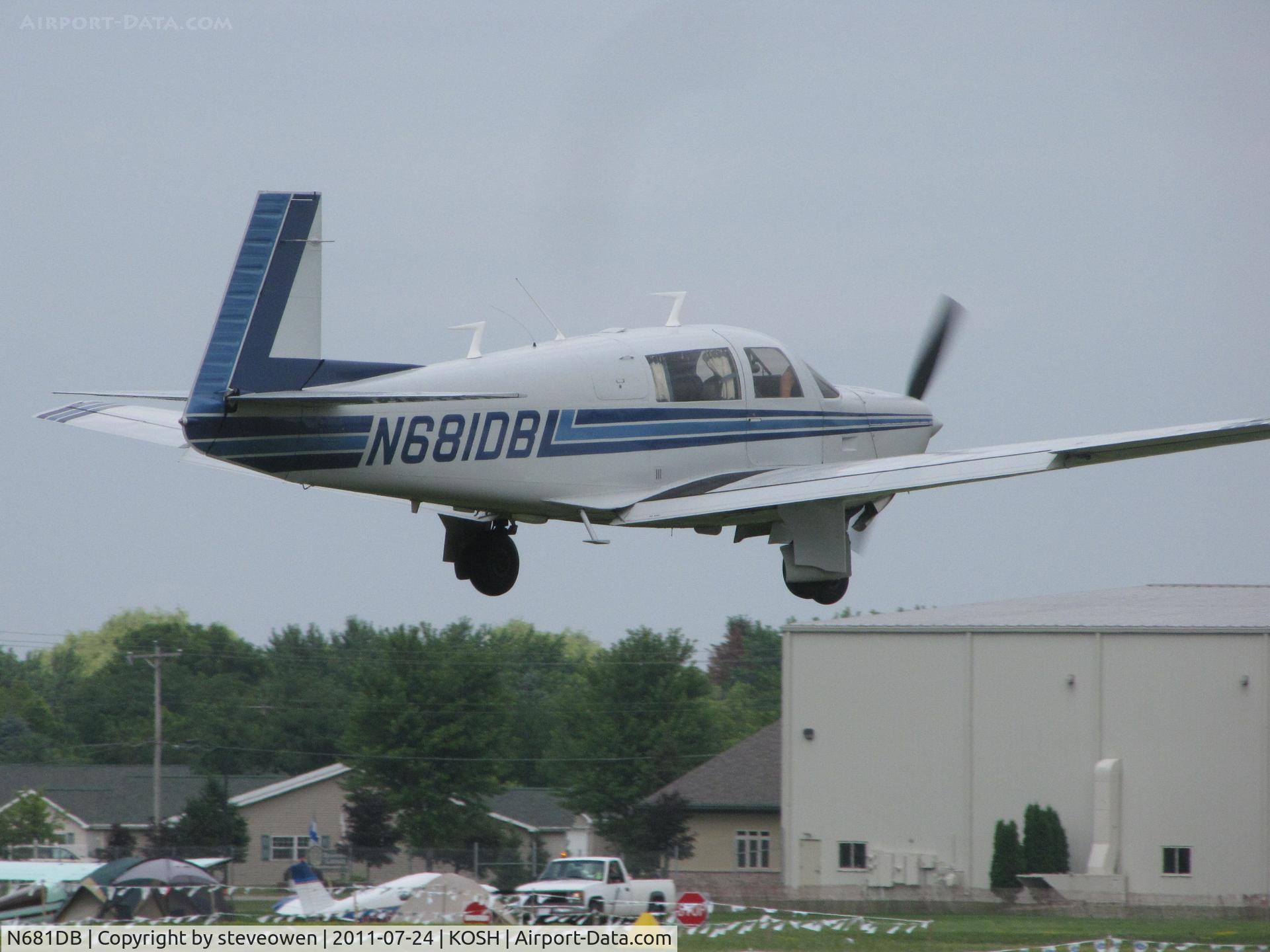 N681DB, 1977 Mooney M20J 201 C/N 24-0126, Landing at KOSH EAA 2011