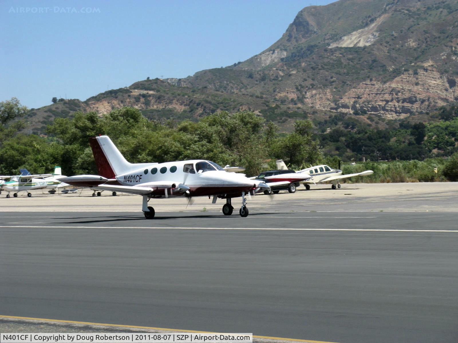 N401CF, 1967 Cessna 401 C/N 401-0115, 1967 Cessna 401. two Continental TSIO-520 Turbocharged 300 Hp each, 8 seats, takeoff roll Rwy 22