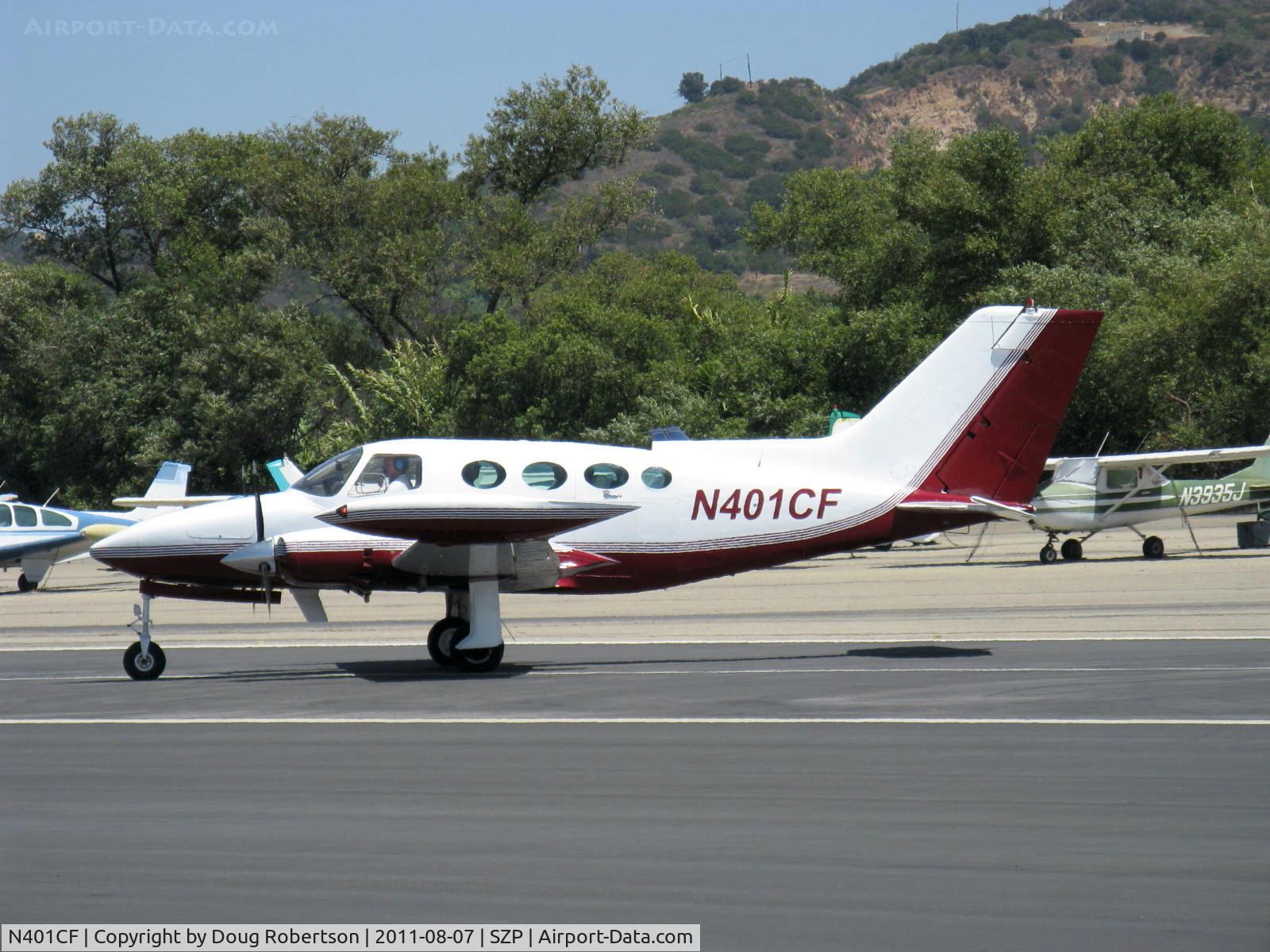 N401CF, 1967 Cessna 401 C/N 401-0115, 1967 Cessna 401, two Continental TSIO-520 Turbocharged 300 Hp each, 8 seats, taxi across Rwy 22