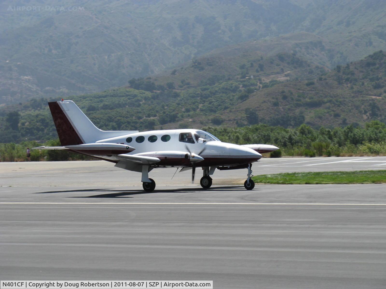 N401CF, 1967 Cessna 401 C/N 401-0115, 1967 Cessna 401, two Continental TSIO-520 Turbocharged 300 Hp each, 8 seats, landing roll Rwy 22
