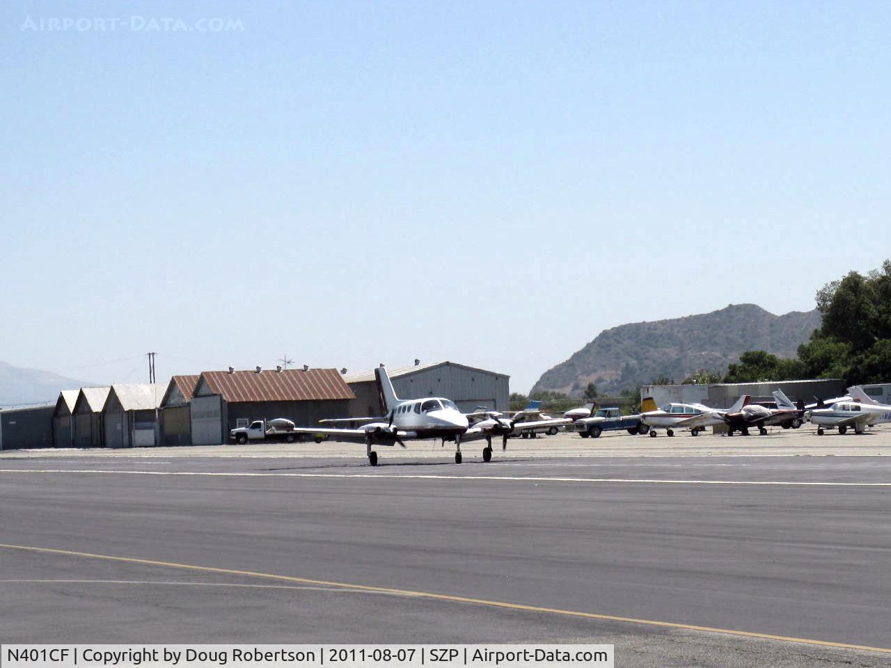 N401CF, 1967 Cessna 401 C/N 401-0115, 1967 Cessna 401, two Continental TSIO-520 Turbocharged 300 Hp each, landing Rwy 22