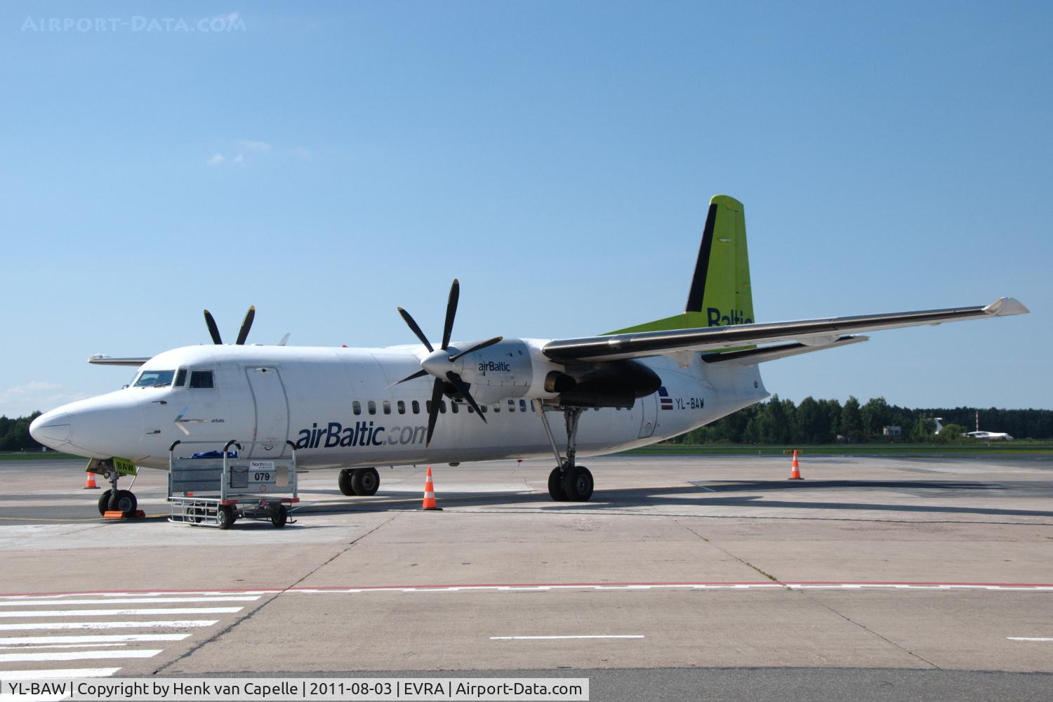 YL-BAW, 1989 Fokker 50 C/N 20148, AirBaltic Fokker 50 parked on the apron of Riga airport.