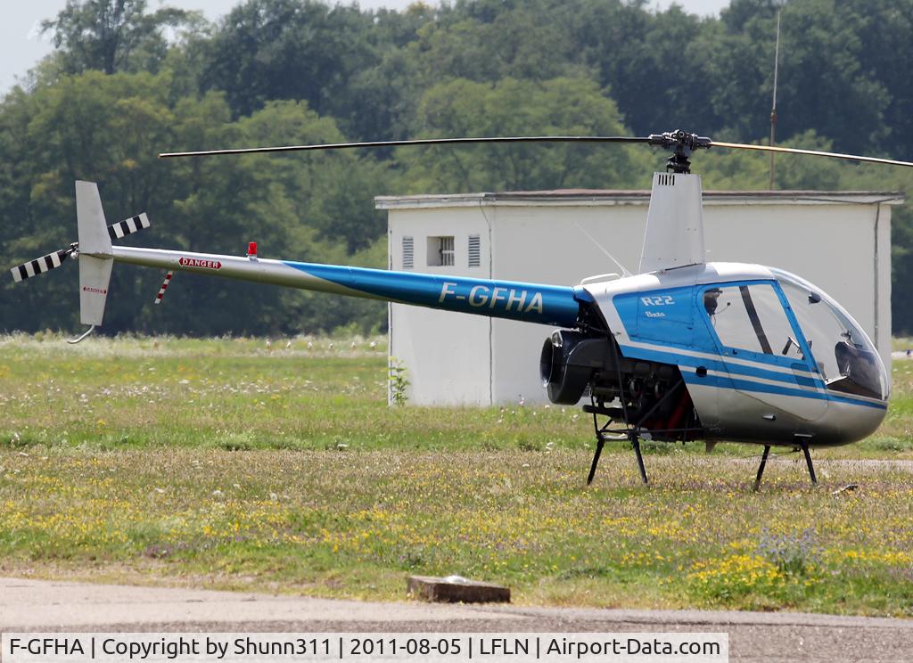 F-GFHA, Robinson R22 Beta C/N 0591, Parked on the grass...