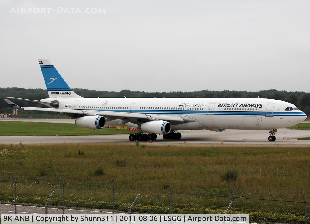 9K-ANB, 1995 Airbus A340-313 C/N 090, Taxiing holding point rwy 23 for departure...