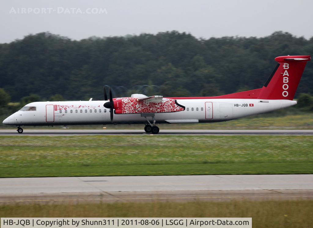 HB-JQB, 2007 De Havilland Canada DHC-8-402Q Dash 8 C/N 4175, Taking off rwy 23... Additional small 'operated by Darwin Airlines' titles near door...