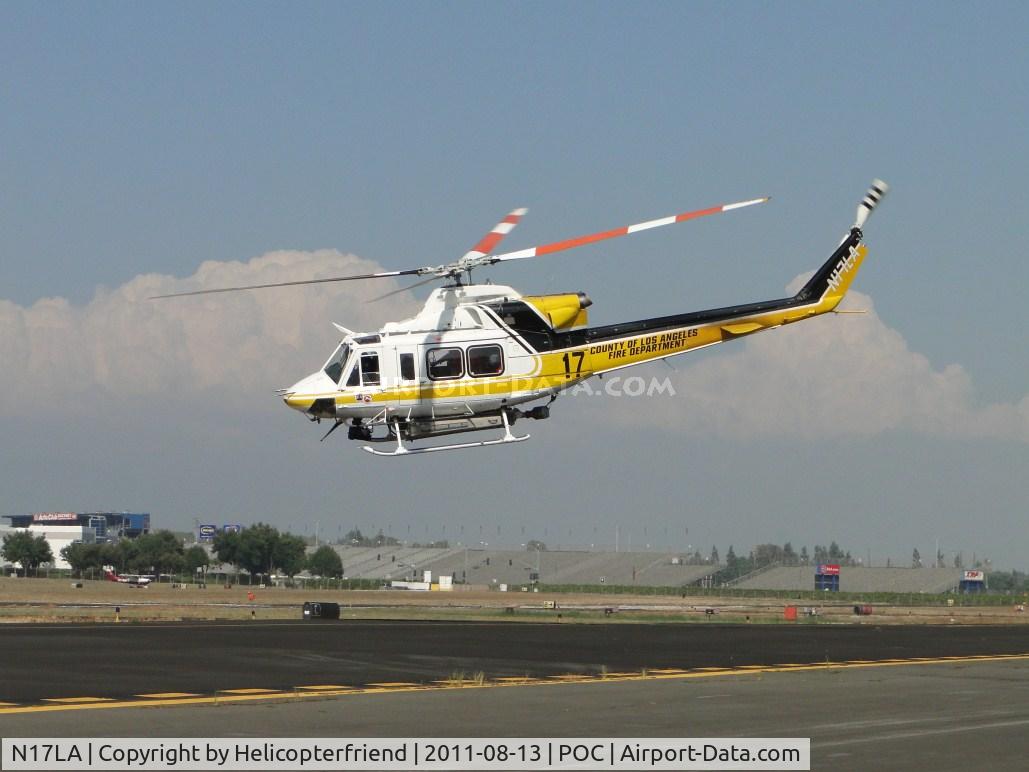 N17LA, 1992 Bell 412 C/N 36044, Air taxiing northbound from Cocco to runway 26L for take off