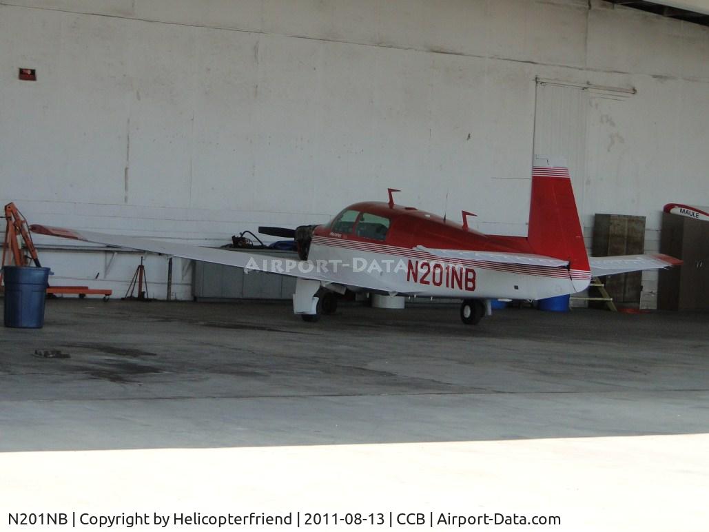 N201NB, 1977 Mooney M20J 201 C/N 24-0090, Parked under the hanger at Foothill Sales & Service