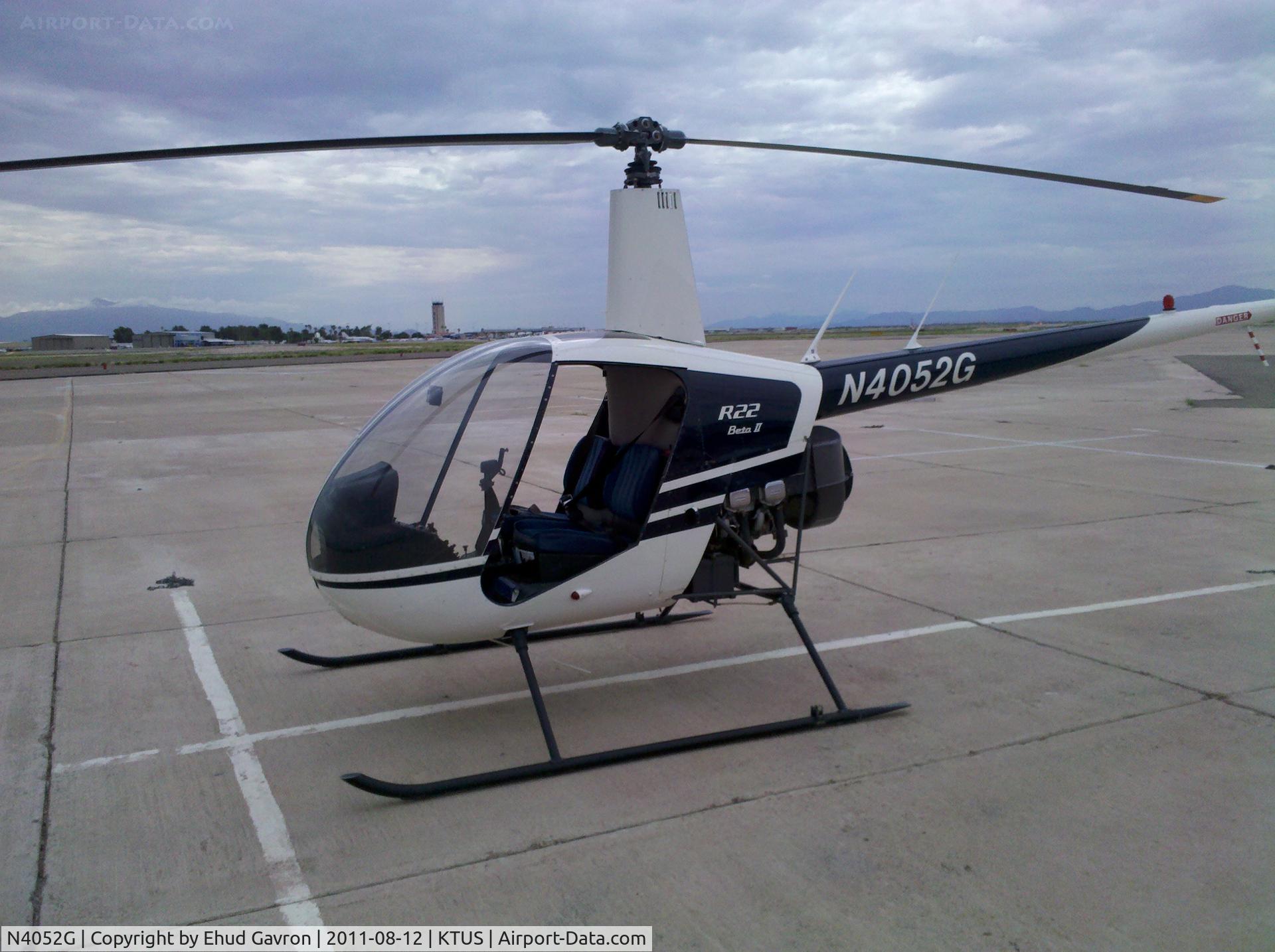 N4052G, 1991 Robinson R22 BETA C/N 1765, N4052G with Tucson Tower in the background.  The doors are off because it's 90°F (32°C) and the humidity was high.