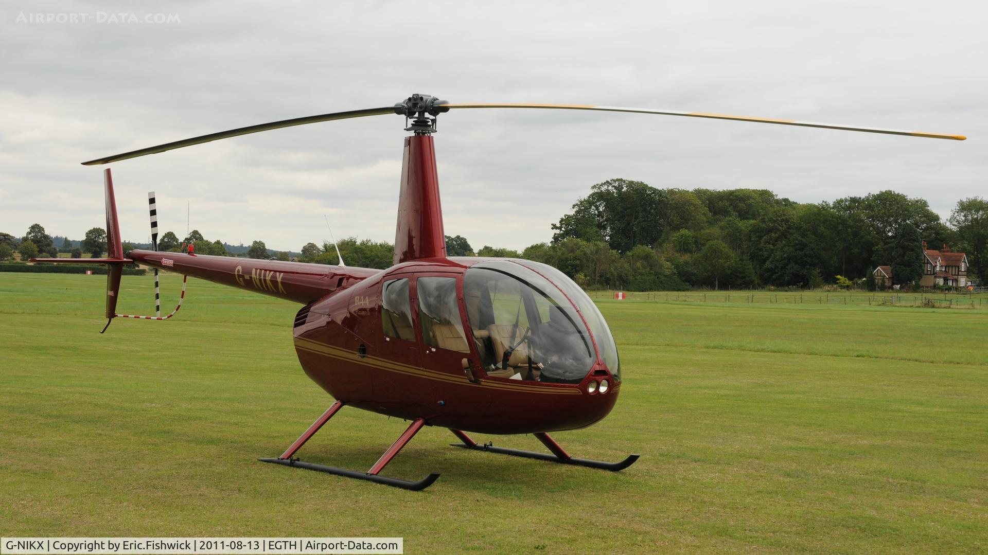 G-NIKX, 2008 Robinson R44 Raven II C/N 12306, 3. G-NIKX at Shuttleworth Evening Air Display, August 2011