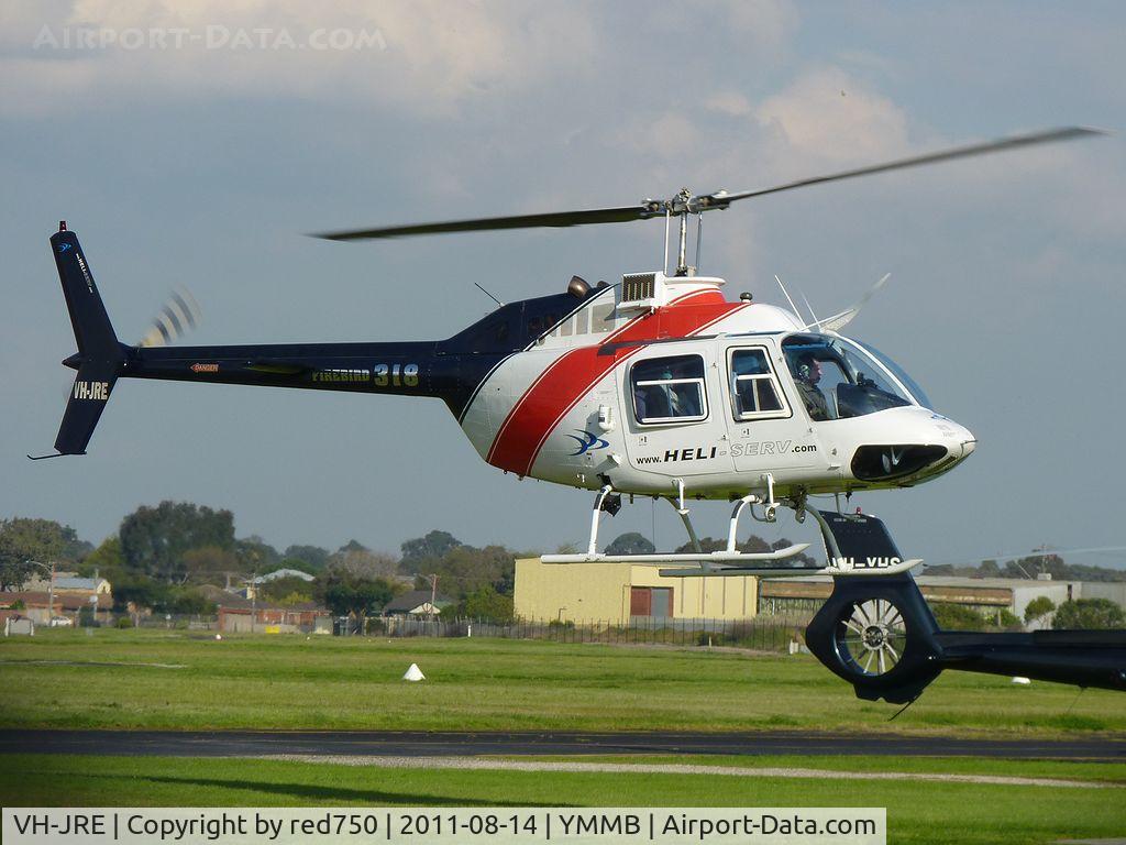 VH-JRE, 1979 Bell 206B-3 JetRanger III C/N 2802, JetRanger VH-JRE air-taxiing from the helipad to the hangar apron.