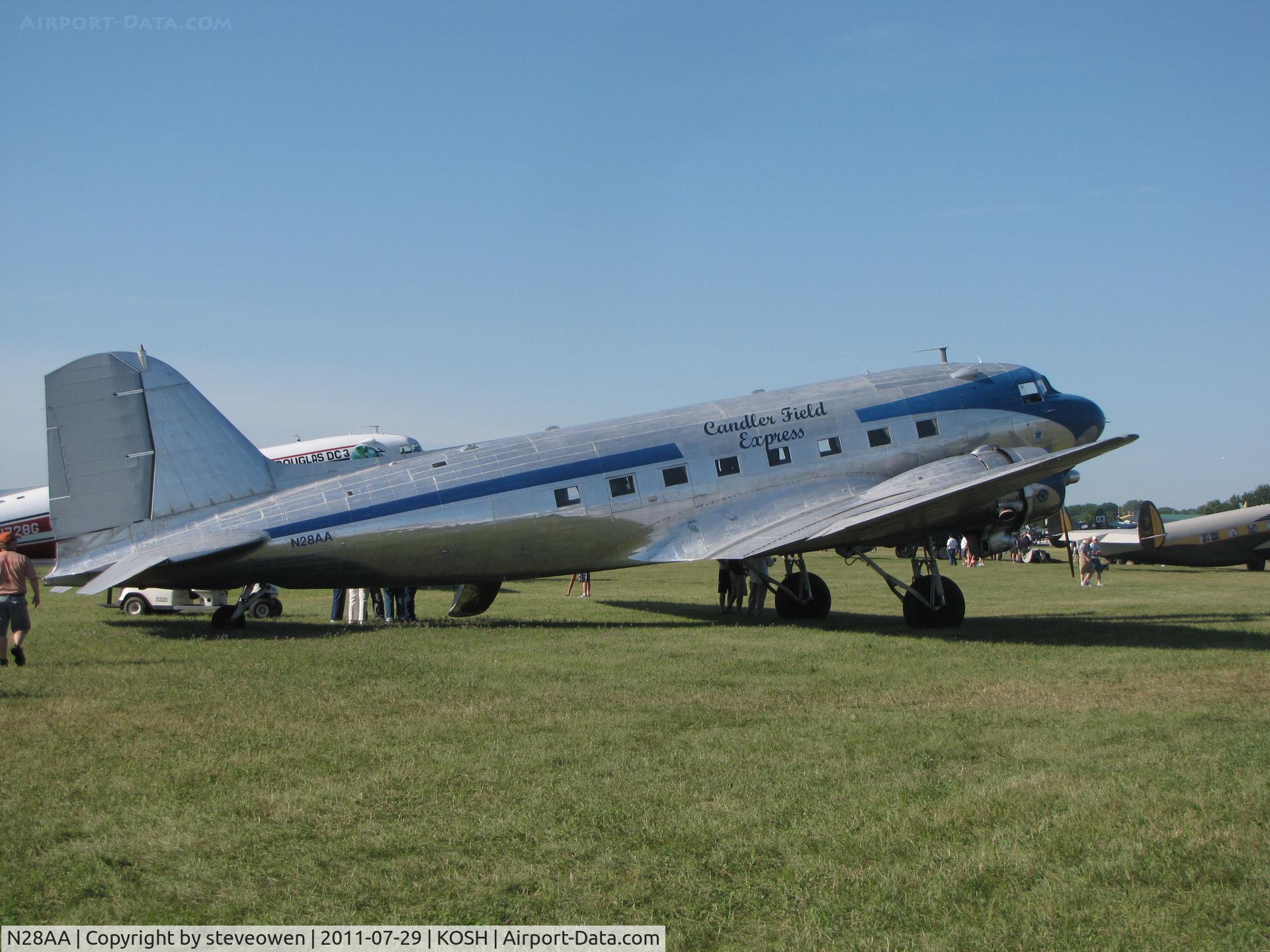N28AA, 1940 Douglas DC-3A C/N 2239, polished and shinning in the Oshkosh sun