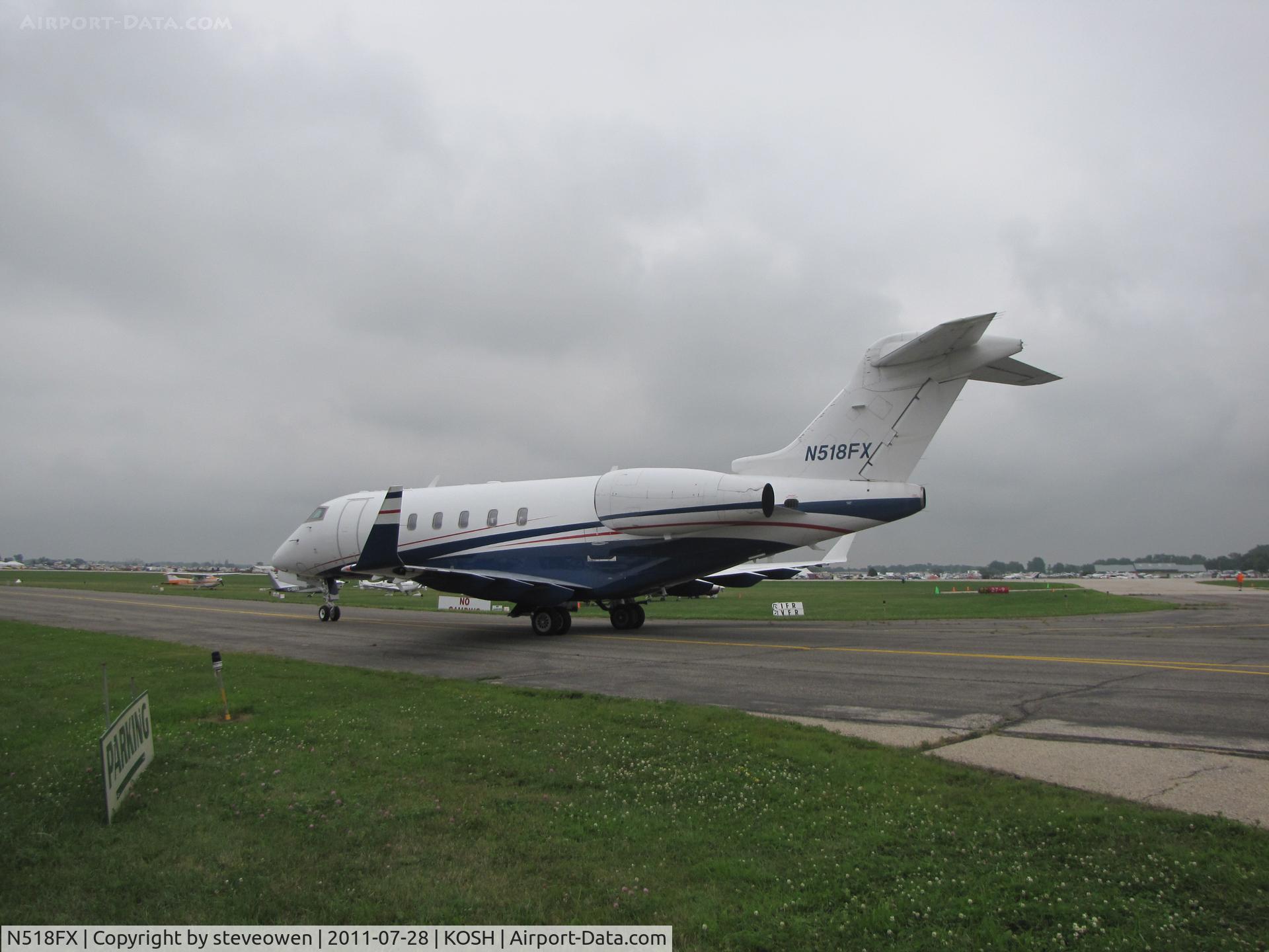 N518FX, 2005 Bombardier Challenger 300 (BD-100-1A10) C/N 20046, taxing during EAA2011