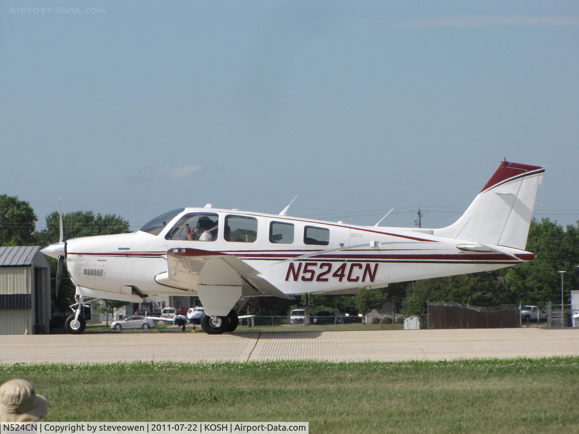 N524CN, 1984 Beech A36 Bonanza 36 C/N E-2144, landing RWY 27 @ EAA2011