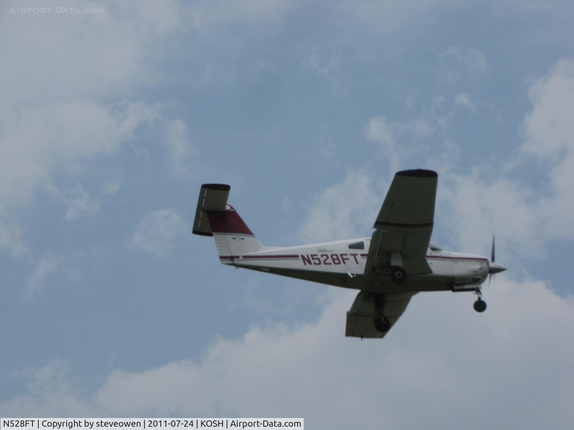 N528FT, 1982 Piper PA-28RT-201 Arrow IV C/N 28R-8218022, over head Rwy 27 @ KOSH