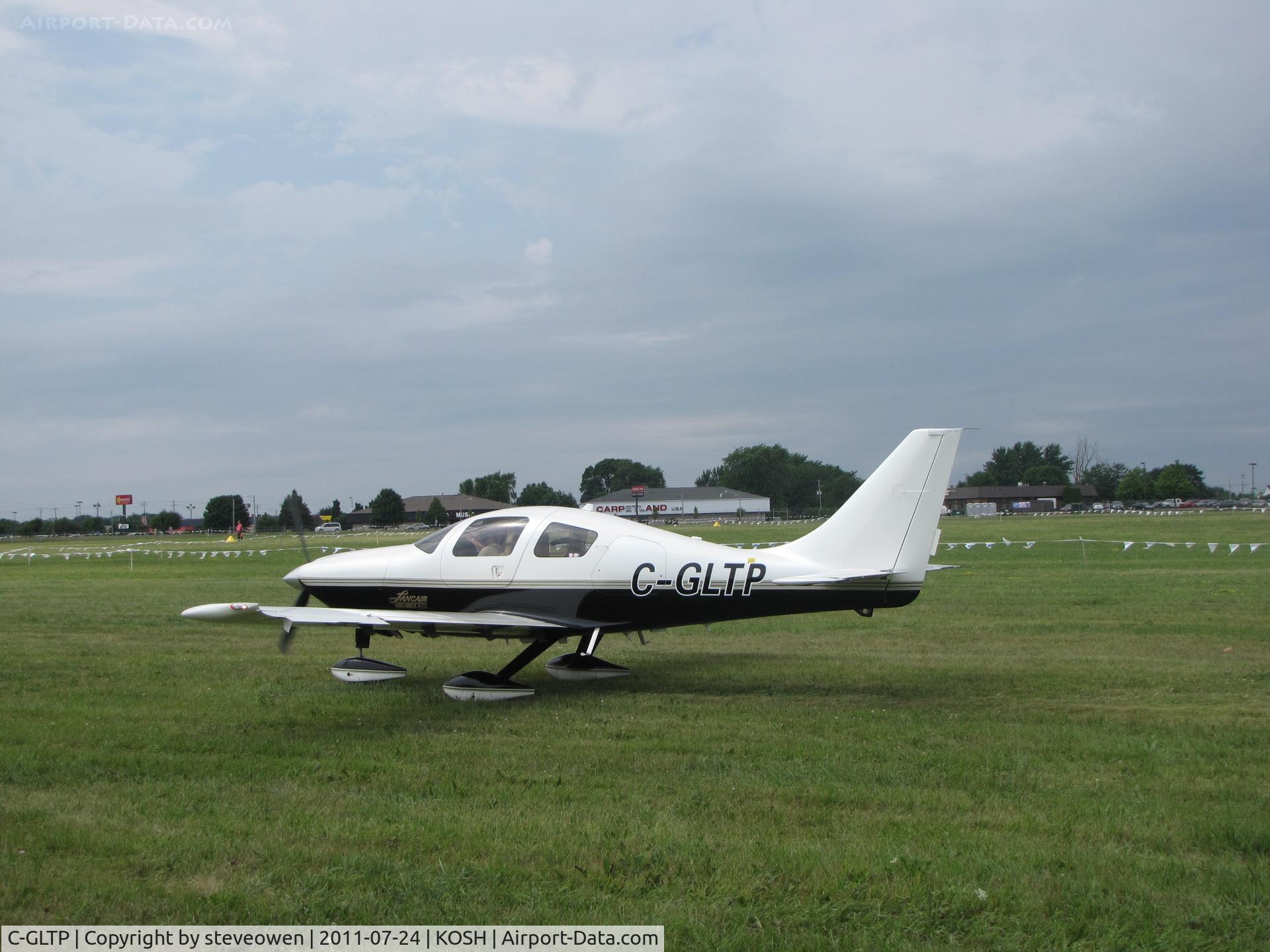 C-GLTP, 2002 Lancair LC40-550FG C/N 40057, Taxing in the grass EAA2011