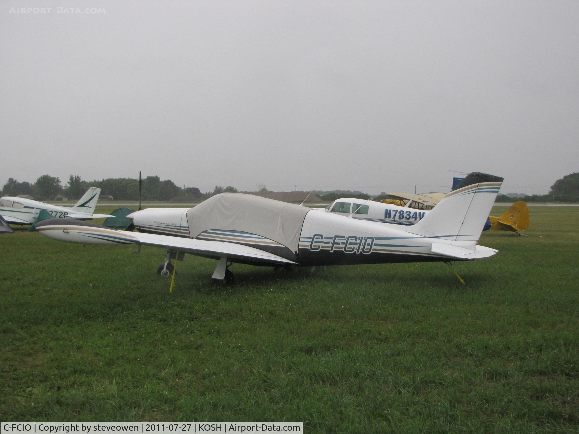 C-FCIO, 1958 Piper PA-24-250 Comanche C/N 24-1306, Vintage Aircraft camp grounds EAA 2011