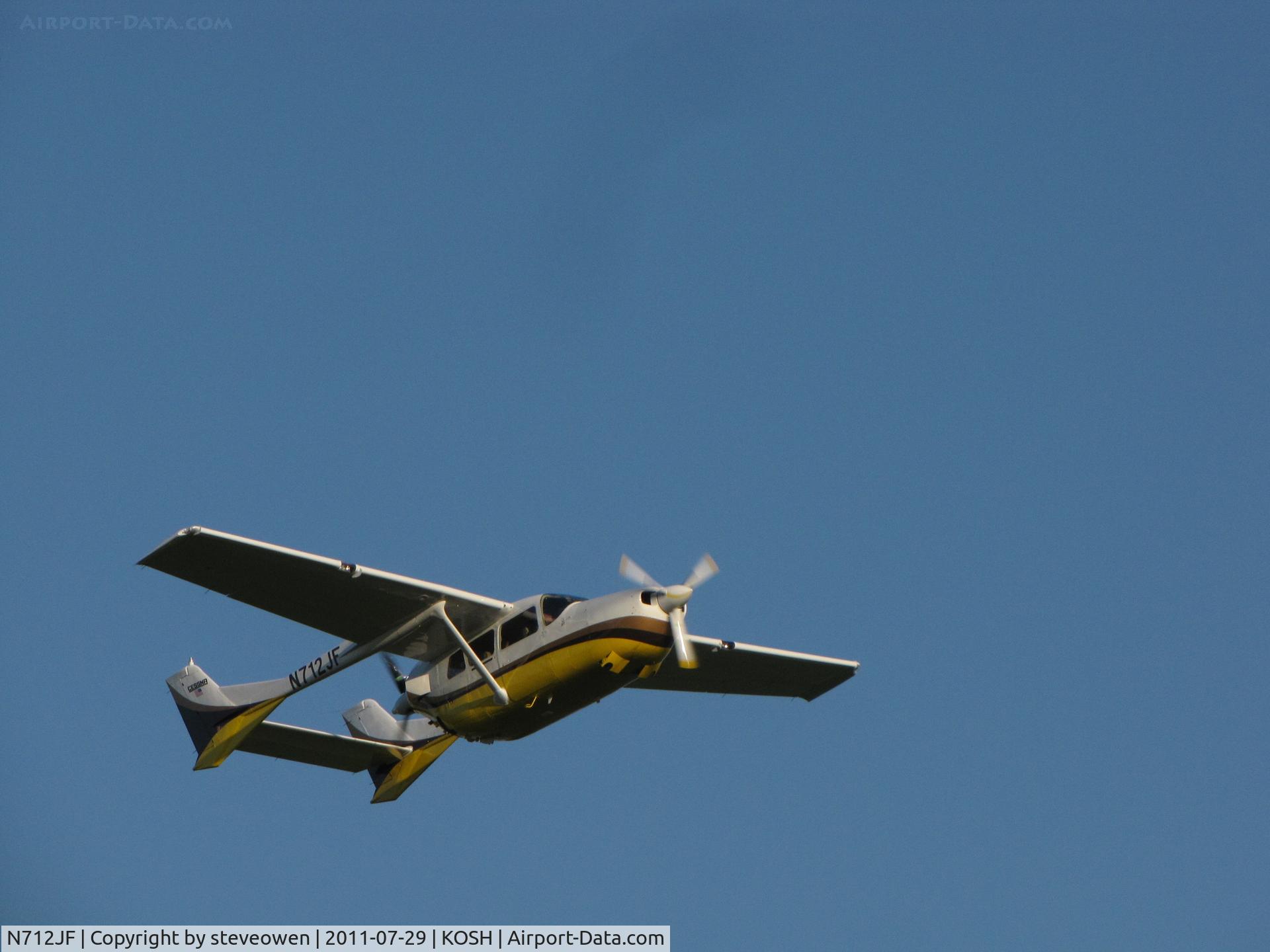 N712JF, 1968 Cessna 337C Super Skymaster C/N 337-0859, Climbing out @ KOSH  EAA 2011