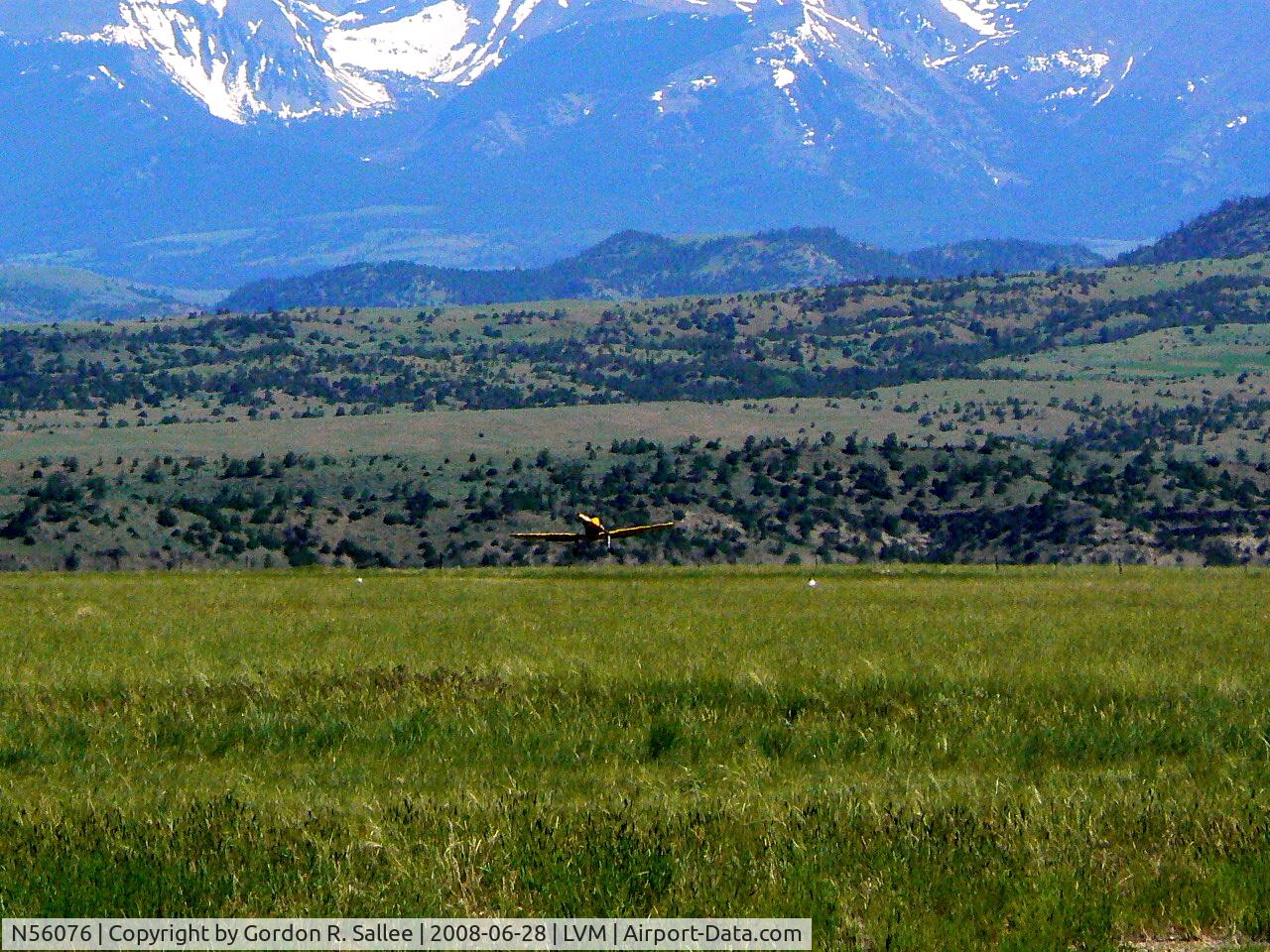 N56076, 1941 Ryan Aeronautical ST3KR C/N 1309, Ronnie Chapel taking off at the Livingston Mt. grass strip.