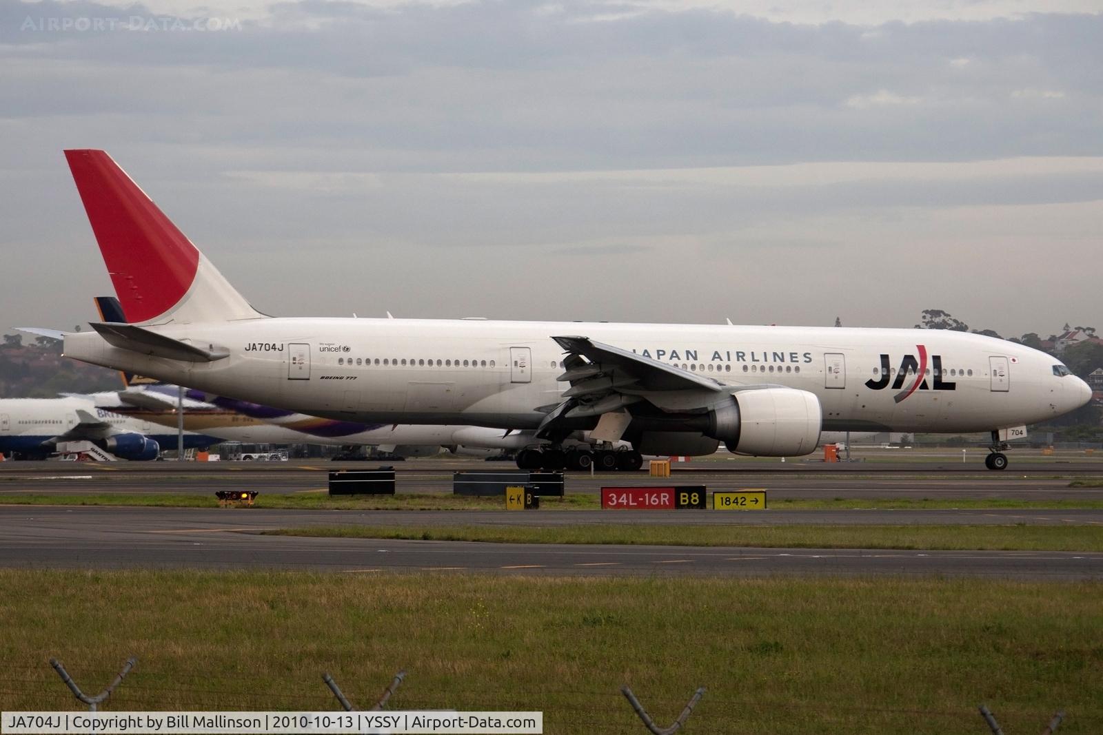 JA704J, 2003 Boeing 777-246/ER C/N 32892, taxi to terminal