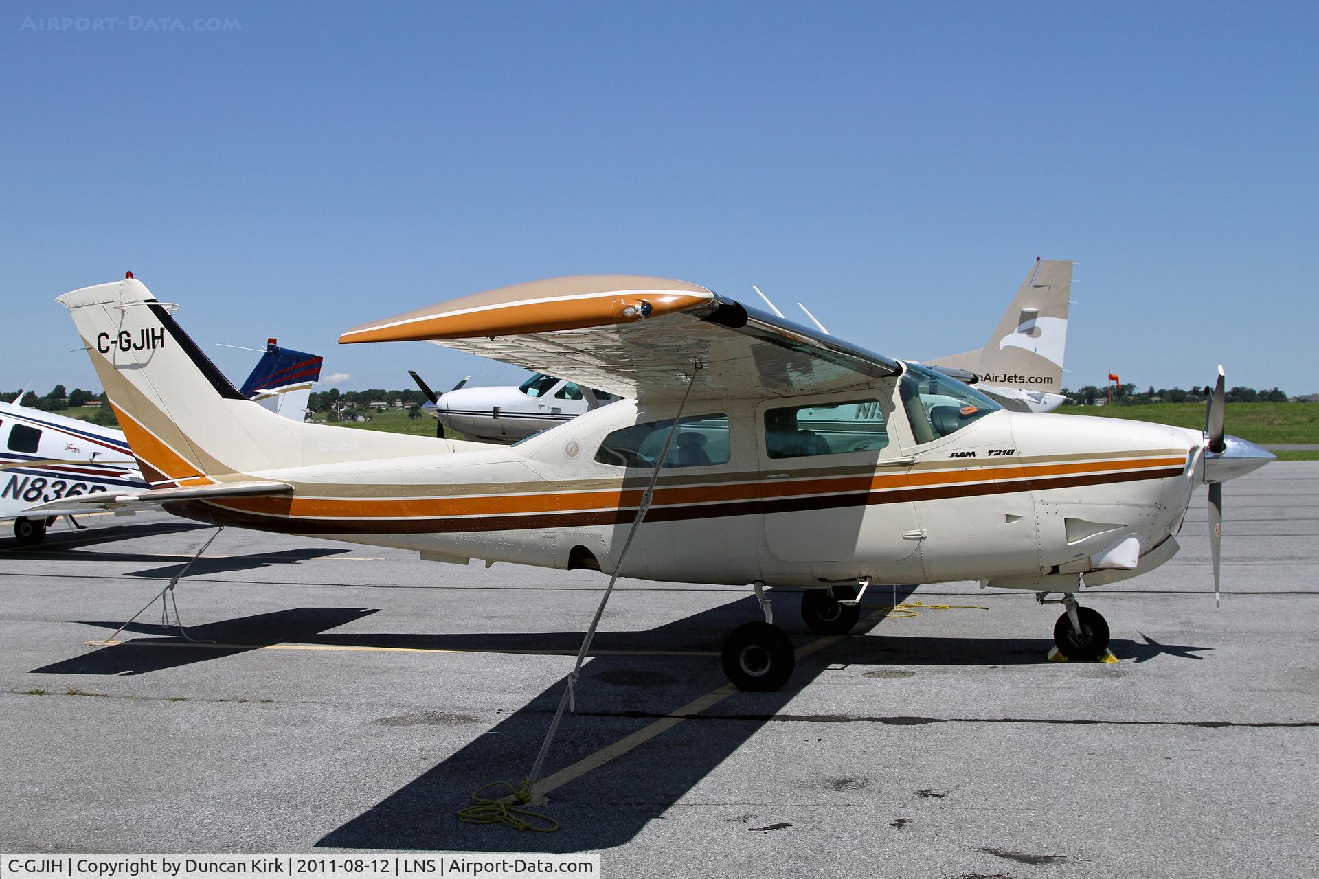 C-GJIH, 1976 Cessna T210L Turbo Centurion C/N 21061552, On the busy ramp at Lancaster