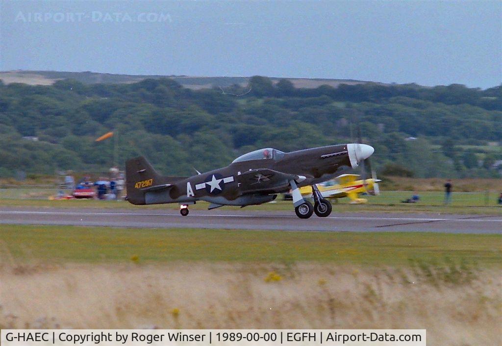G-HAEC, 1951 Commonwealth CA-18 Mustang 22 (P-51D) C/N CACM-192-1517, Displayed at the Swansea Airport Airshow in 1989. Became BIG BEAUTIFUL DOLL. Registered D-FBBD in June 2011.