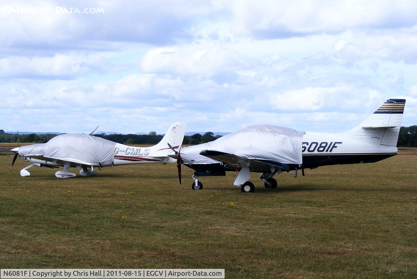 N6081F, 2001 Rockwell Commander 114-B C/N 14681, alongside G-CMLS Cirrus SR-20