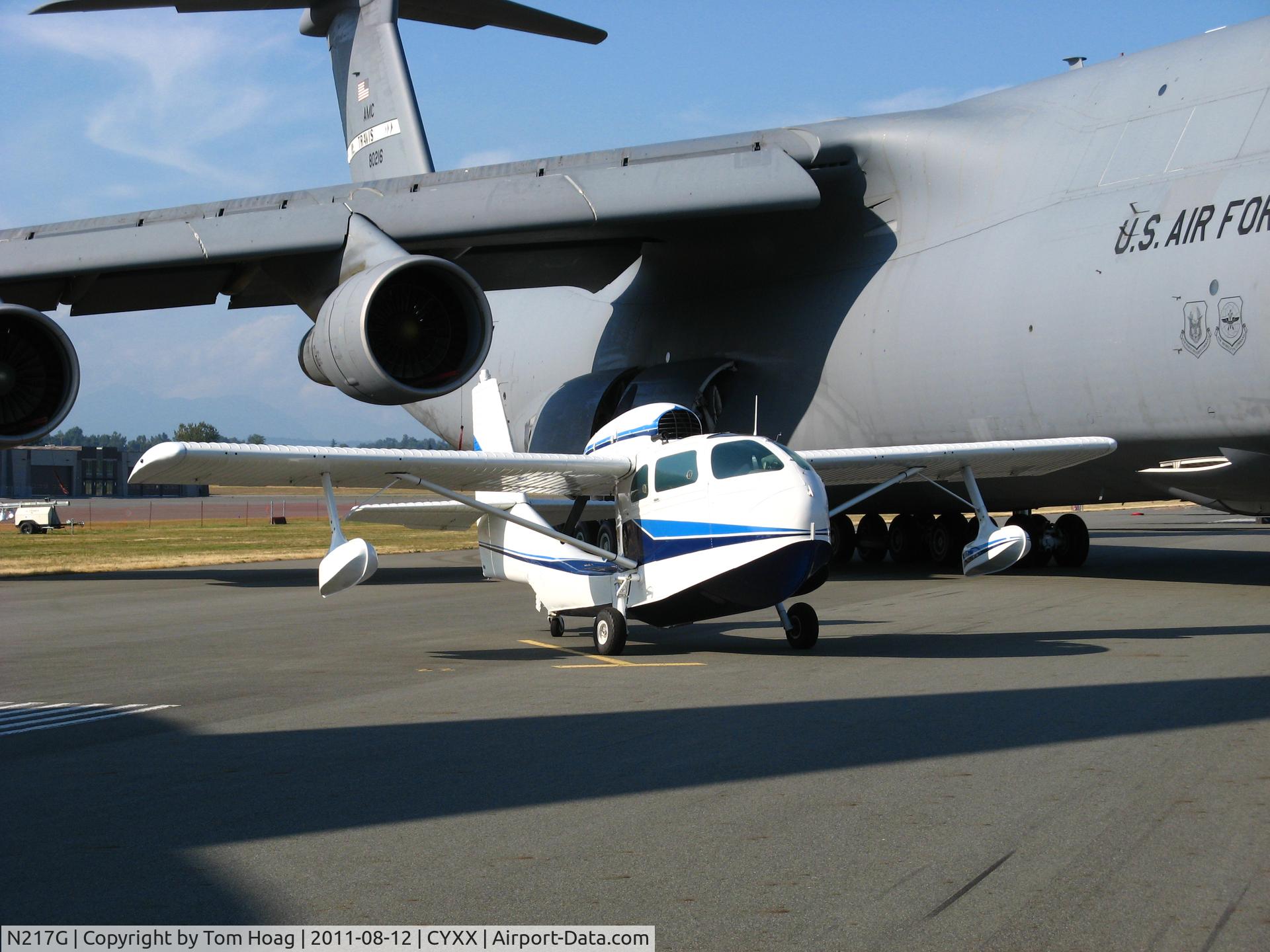 N217G, 1947 Republic RC-3 Seabee C/N 797, Abbotsford Airshow 2011  
Republic Seabee N217G under the wing of a C-5 in the static aircraft display.
