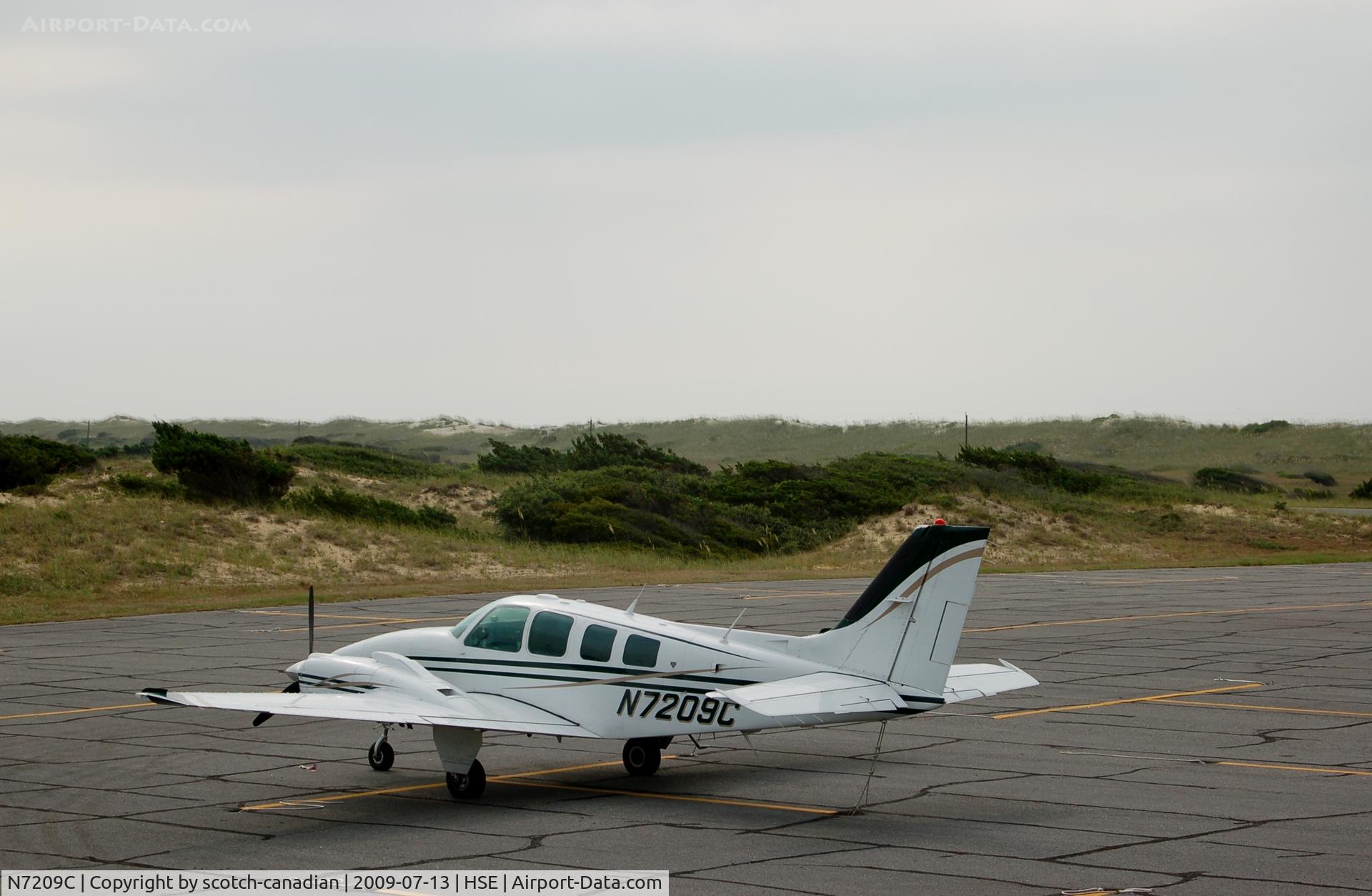 N7209C, 1984 Beech 58 Baron C/N TH-1424, 1984 Beech B-58 N7209C at Billy Mitchell Airport, Frisco, NC