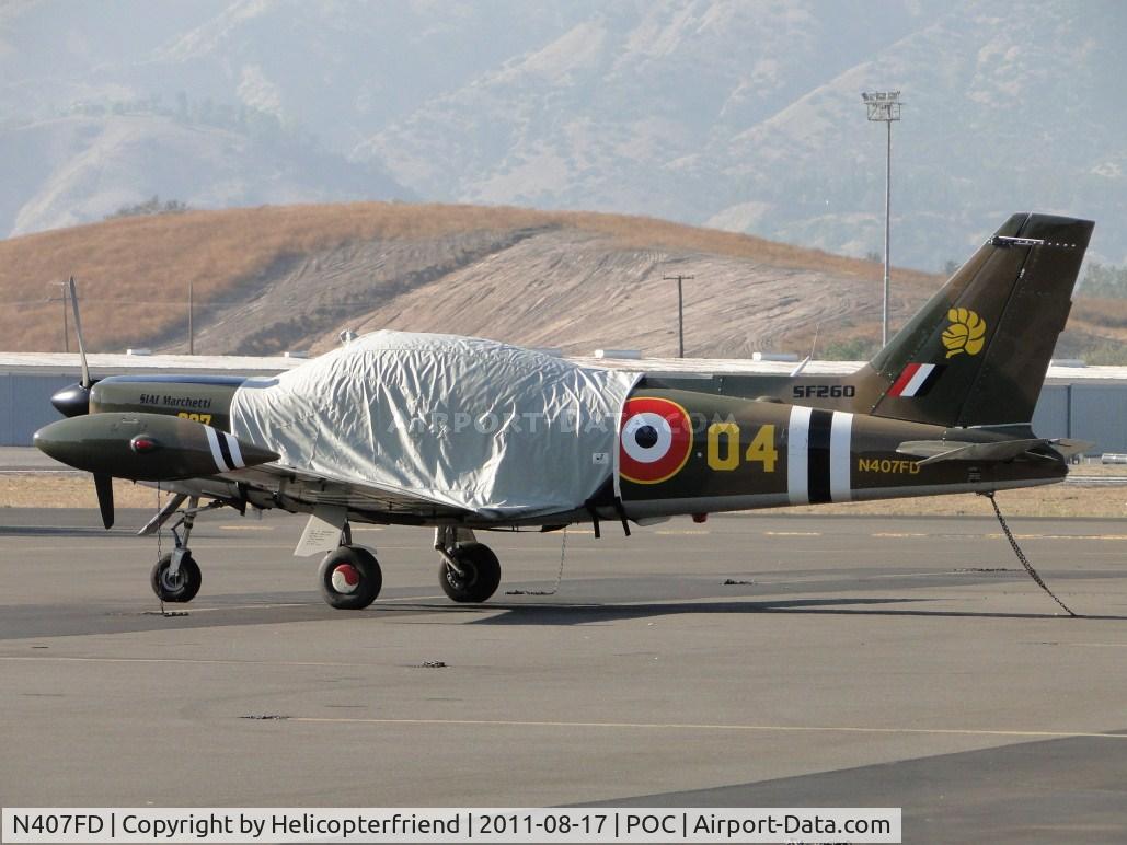 N407FD, 1990 SIAI-Marchetti SF-260D C/N 772, Covered, tied down and parked in transient parking