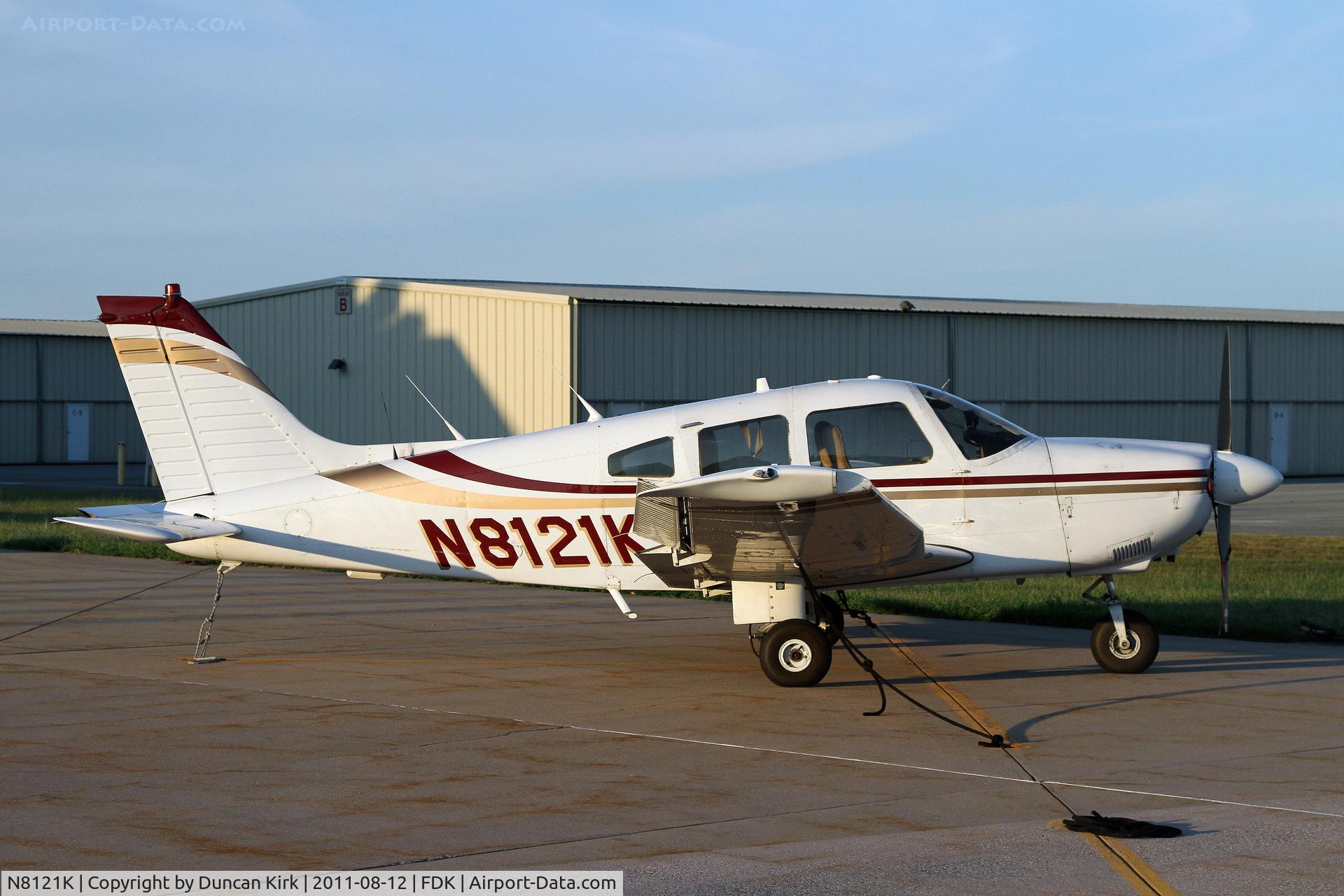N8121K, 1979 Piper PA-28-181 C/N 28-8090142, Nice evening light on this Cherokee near the AOPA headquarters