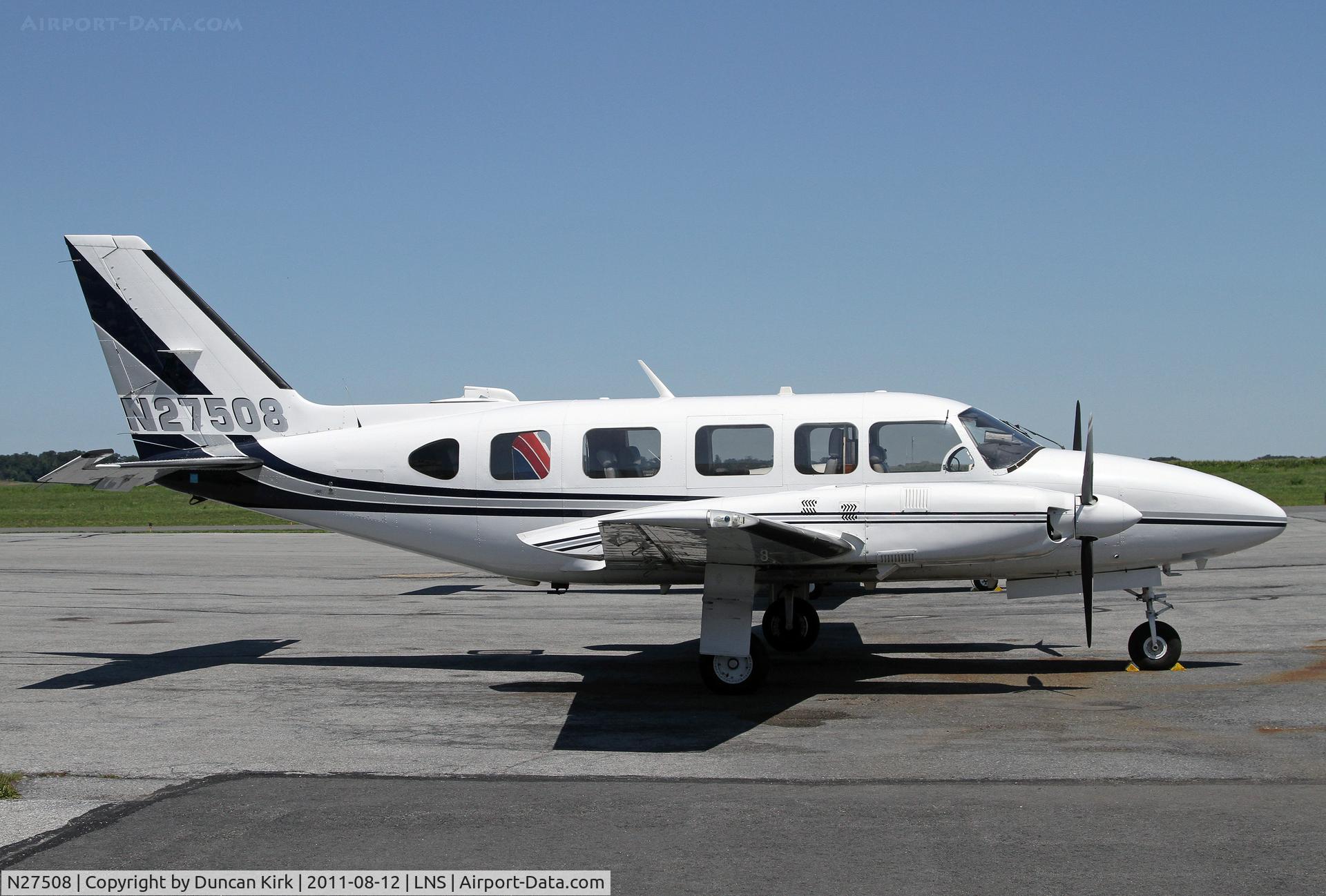 N27508, 1977 Piper PA-31-350 Chieftain C/N 31-7852031, On the busy Lancaster FBO ramp