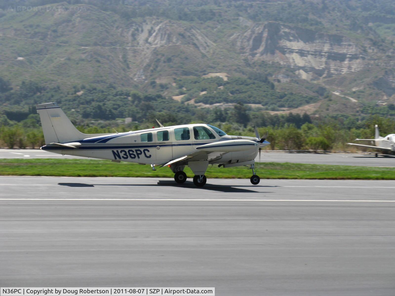 N36PC, 1979 Beech A36 Bonanza 36 C/N E-1528, 1979 Beech A36 BONANZA Machen Turbo Lycoming TIO-540-J conversion 350 Hp, Machen made 40 of these conversions, tip tanks long range mod, landing roll Rwy 22