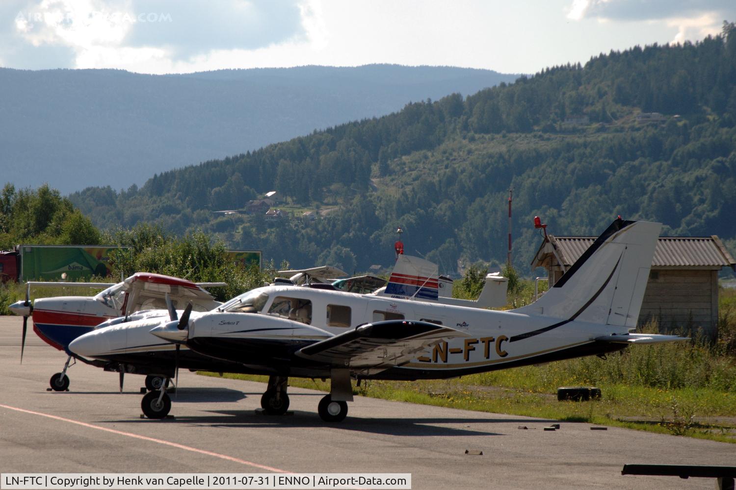 LN-FTC, 2007 Piper PA-34-220T V C/N 3449352, Piper Seneca V, operated by Luftfartsskolen Notodden, on the platform of Notodden airfield.
