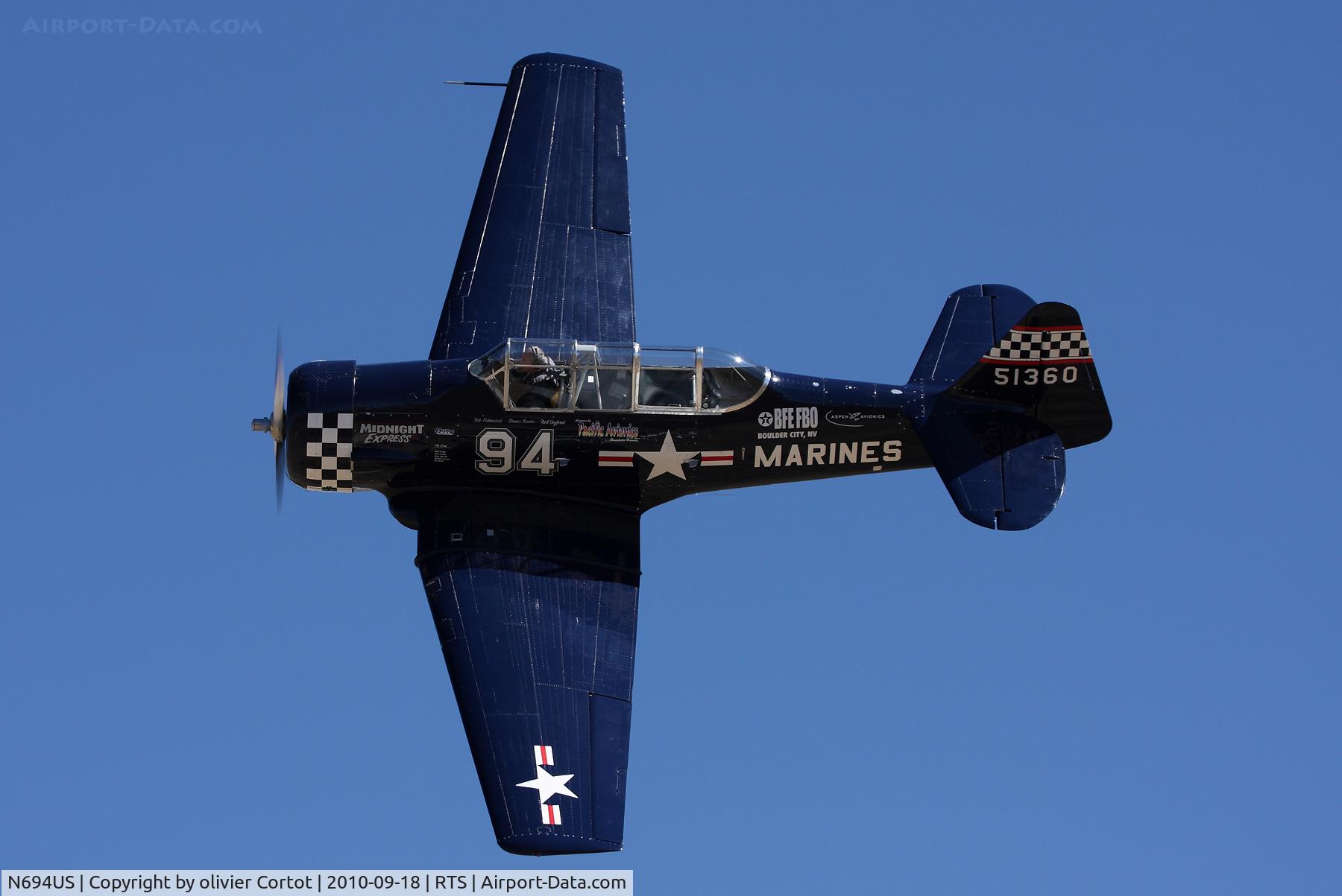 N694US, 1943 North American SNJ-4 Texan C/N 88-13627, racing at Reno, 2010