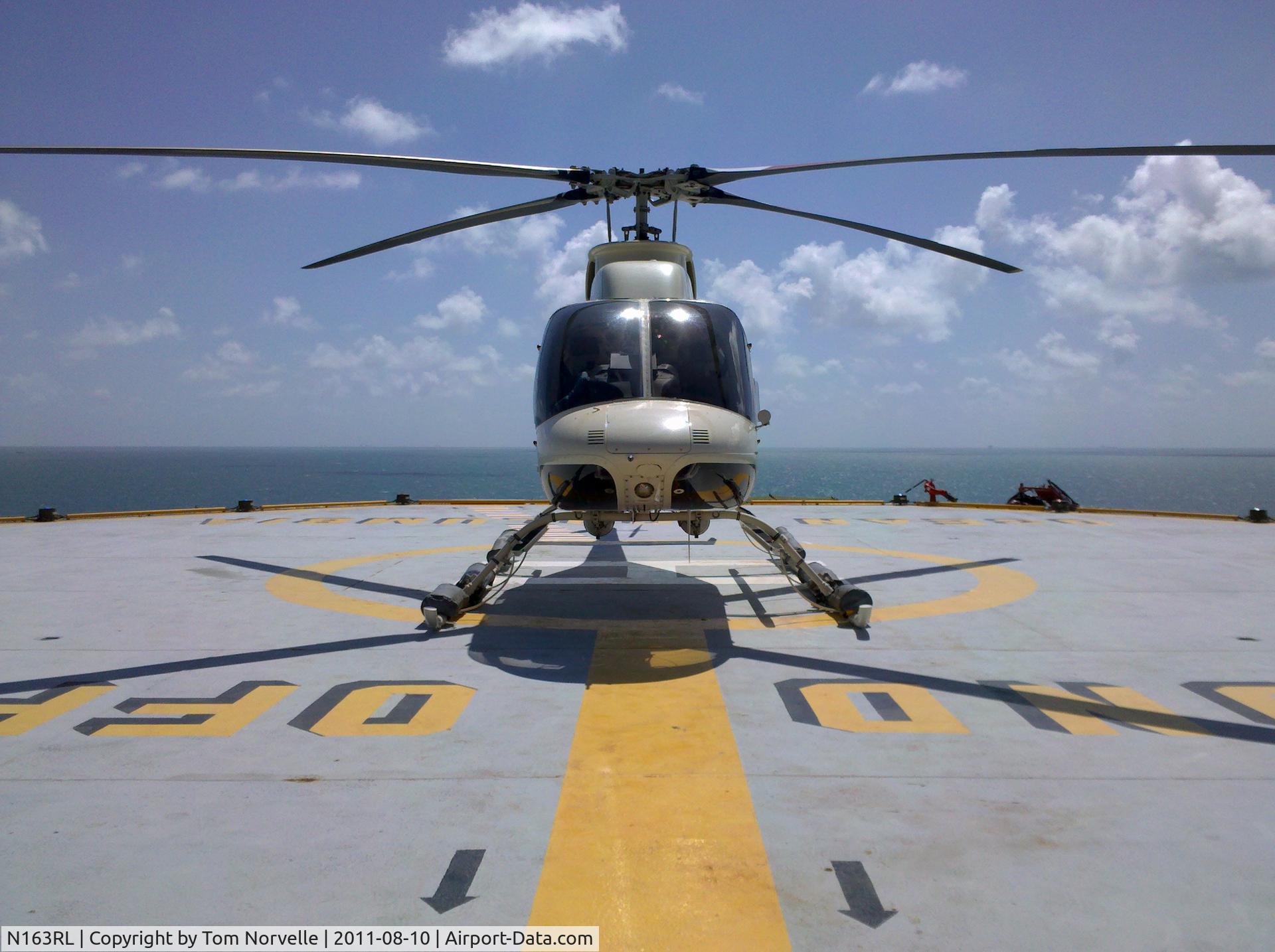 N163RL, Bell 407 C/N 53163, N163RL on the deck at the Ocean Columbia Drilling Rig.