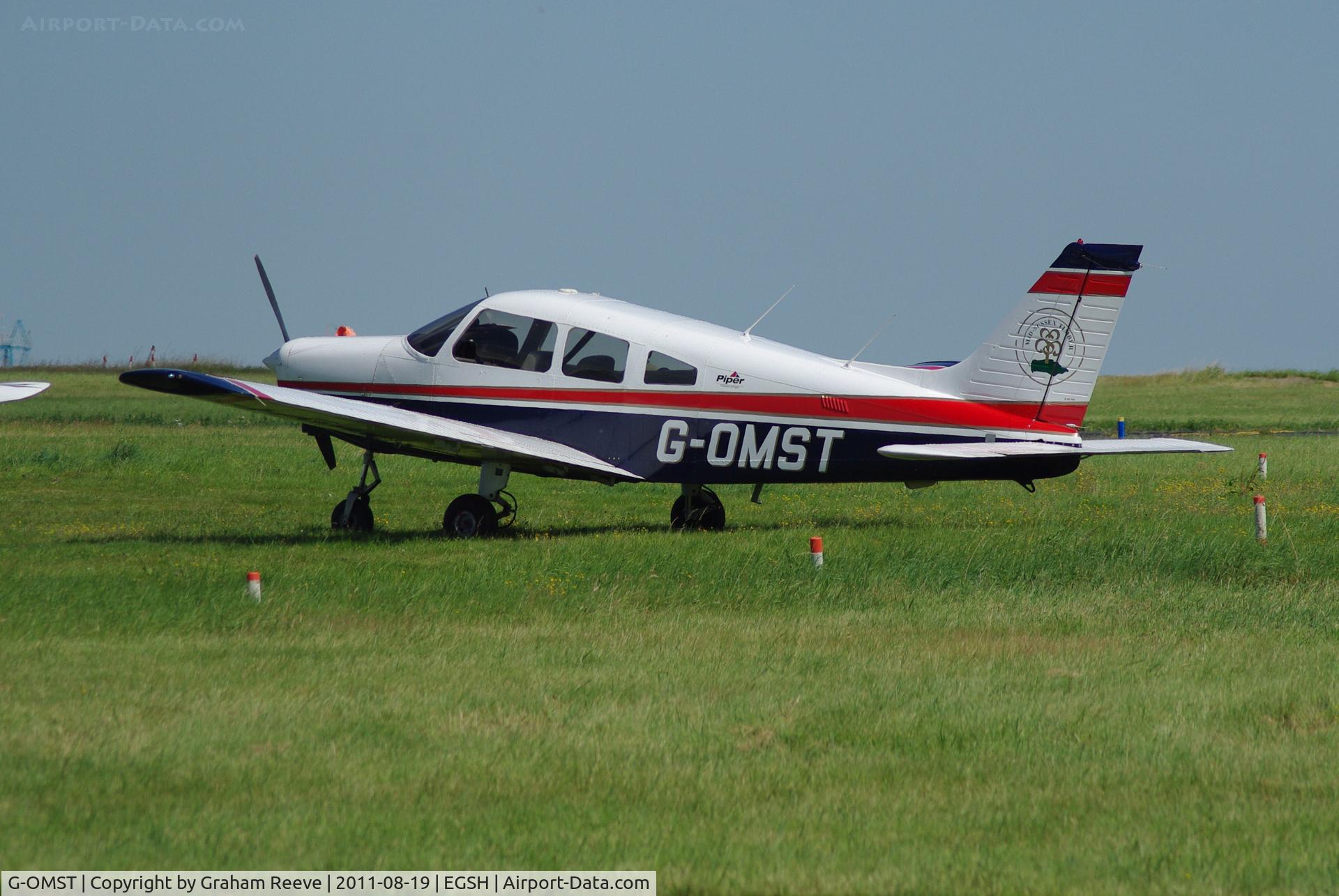 G-OMST, 2001 Piper PA-28-161 Cherokee Warrior III C/N 2842121, Parked at Norwich.