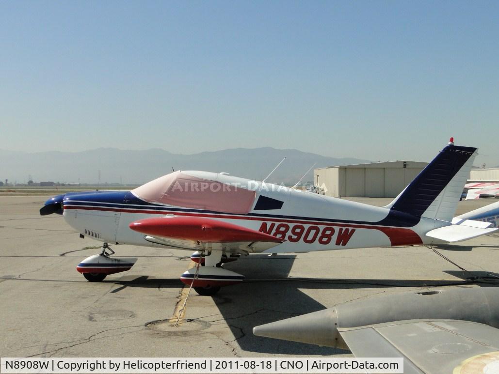 N8908W, 1964 Piper PA-28-235 Cherokee C/N 28-10475, Covered, tied down and parked